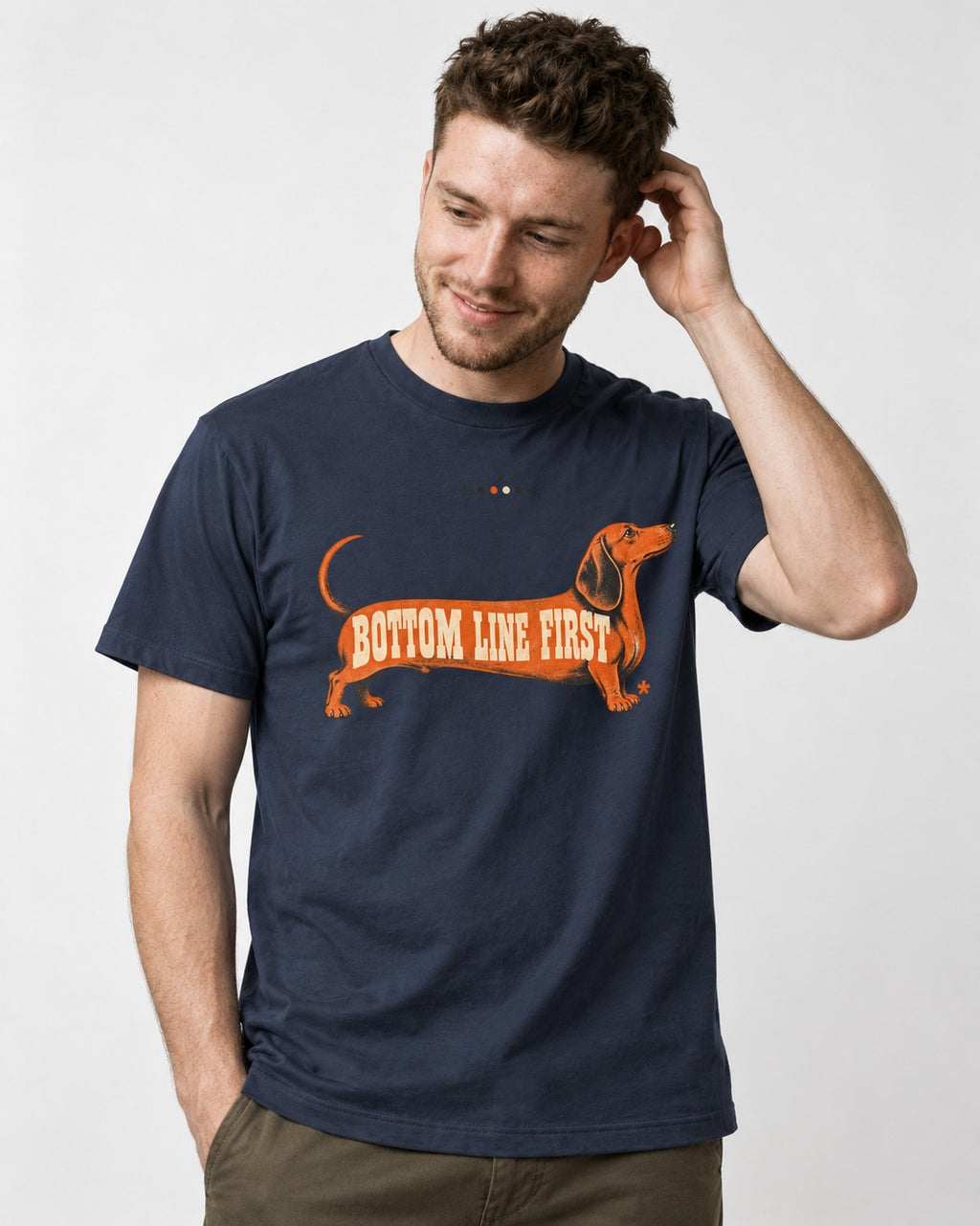 Dachshund Bottom Line First Body Lettering Graphic T-Shirt in Navy, worn by a model