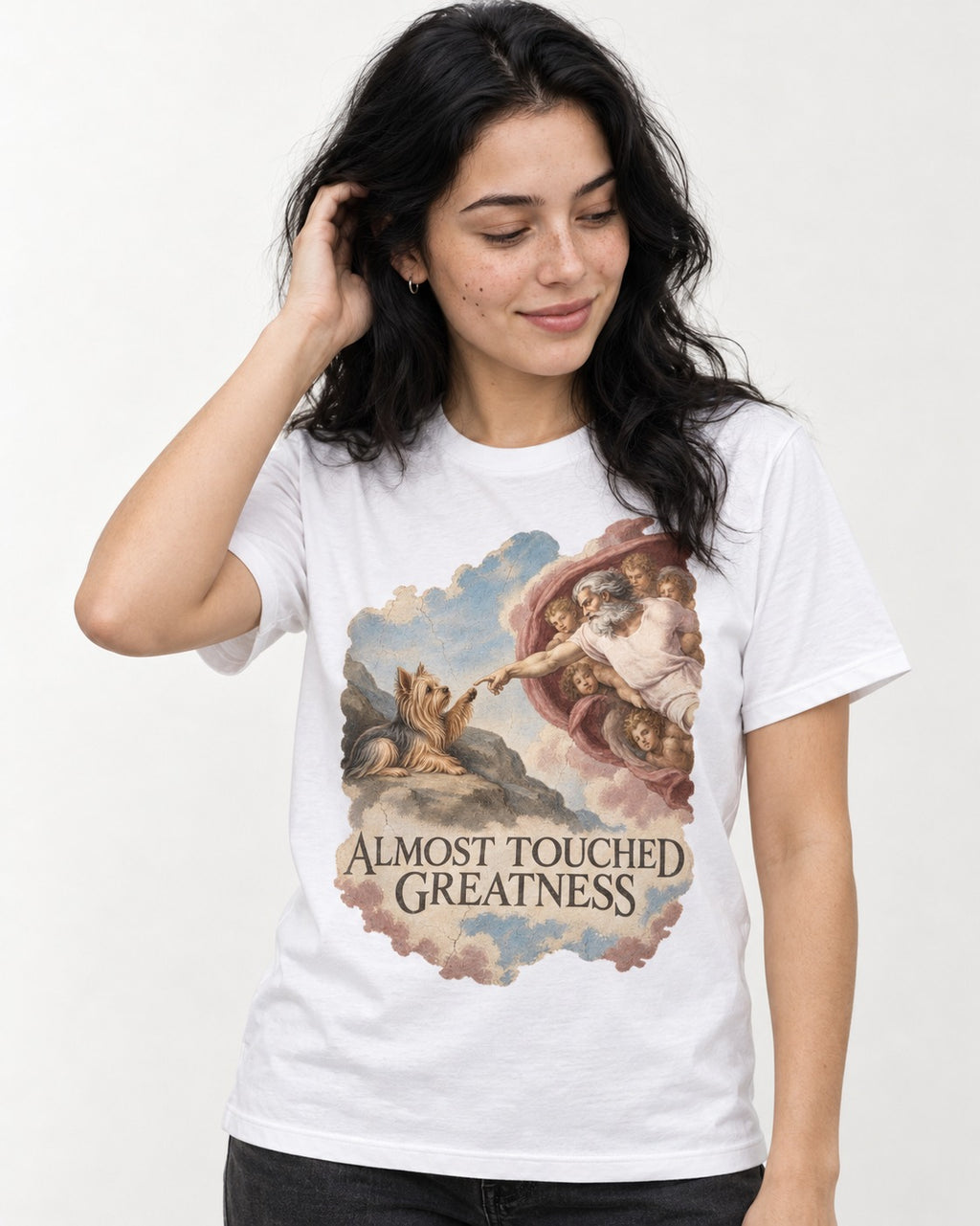 Yorkshire Terrier Almost Touched Greatness Creation Parody Graphic T-Shirt in White, worn by a model