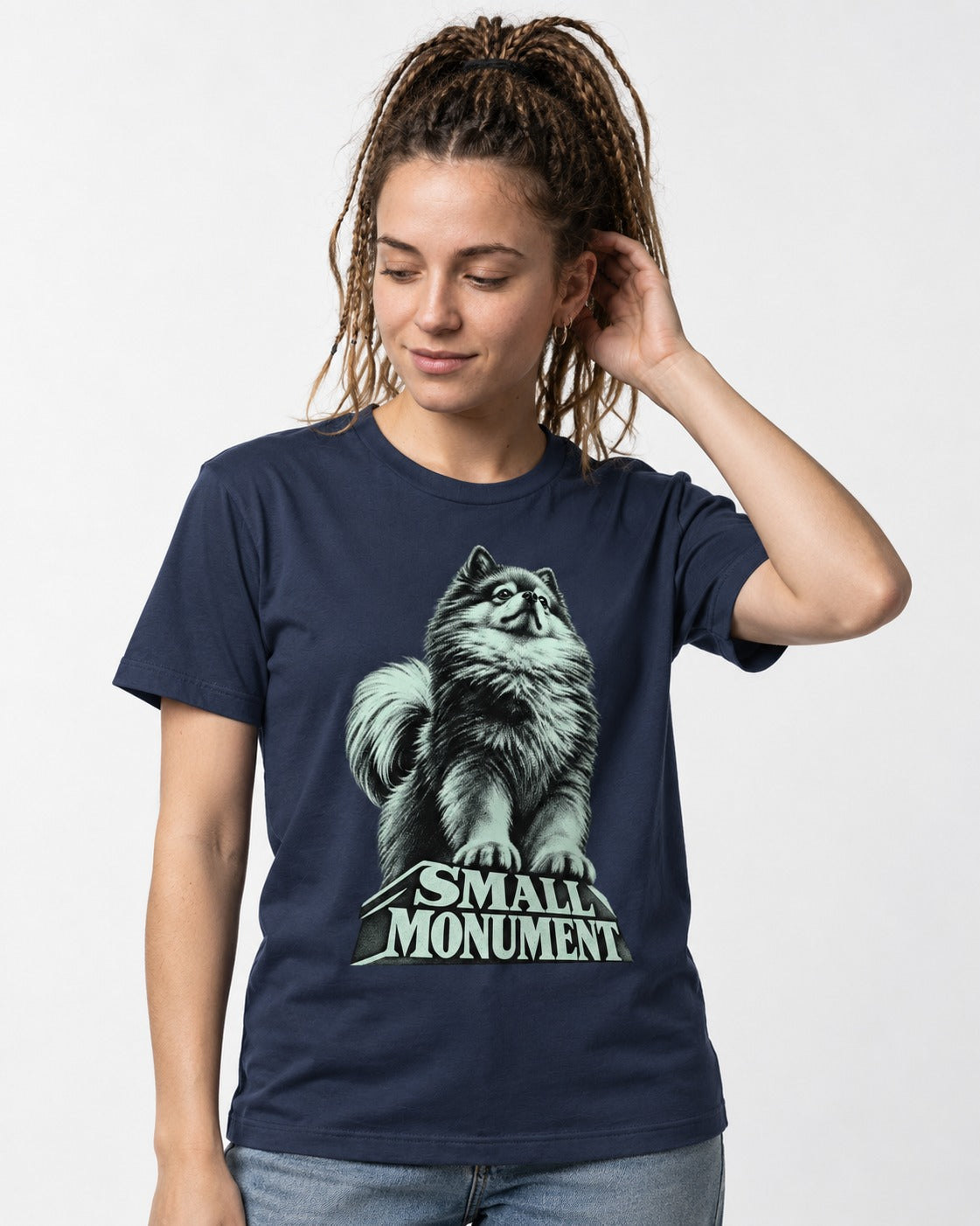 Pomeranian Small Monument Pedestal Graphic T-Shirt in Navy, worn by a model