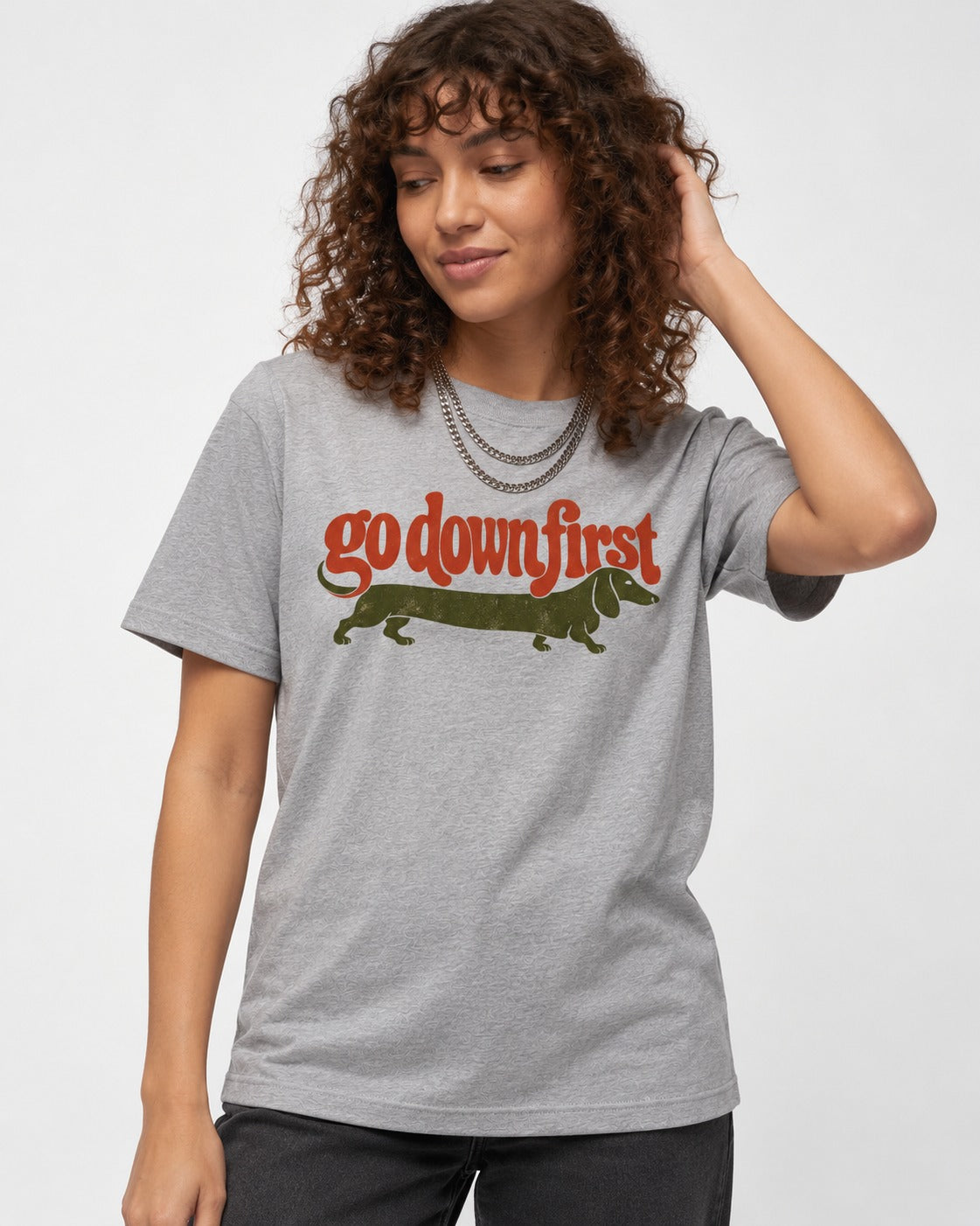 Dachshund Goes Down First T-Shirt in Sport Grey, worn by a model