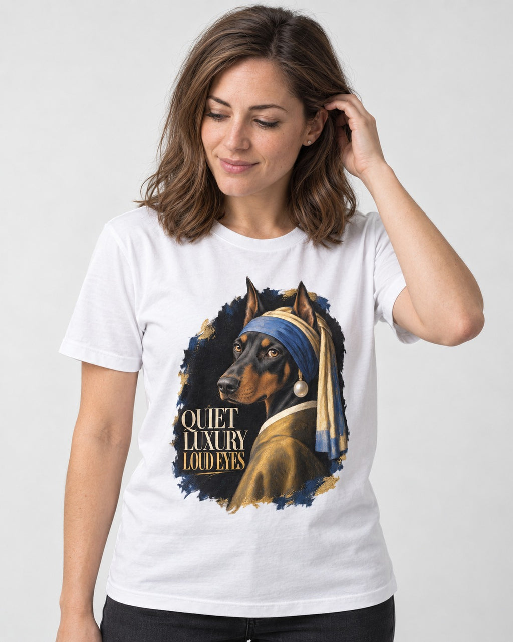 Doberman Quiet Luxury Loud Eyes Pearl Portrait Graphic T-Shirt in White, worn by a model