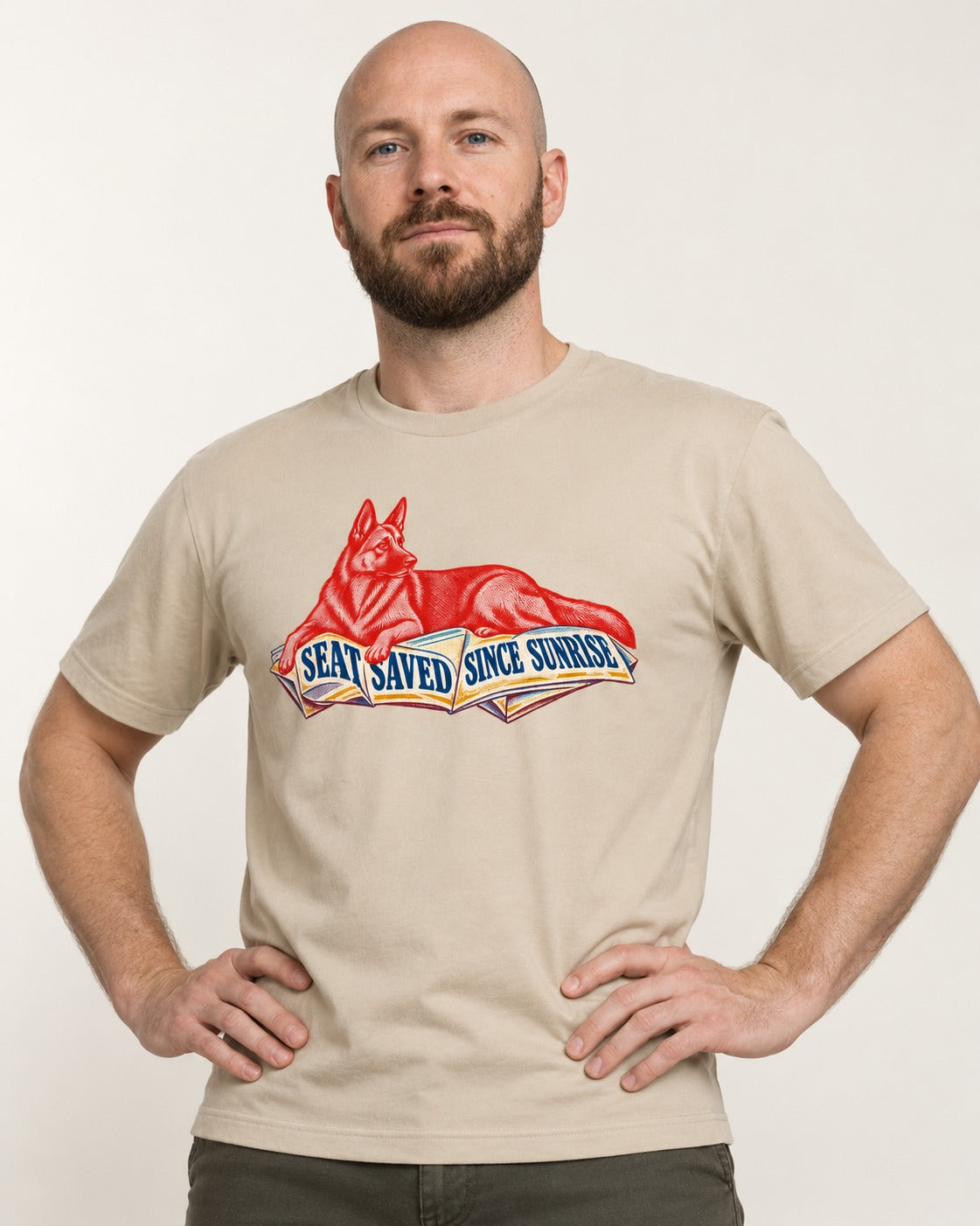 Seat Saved Since Sunrise German Shepherd Dog T-Shirt in Sand, worn by a model