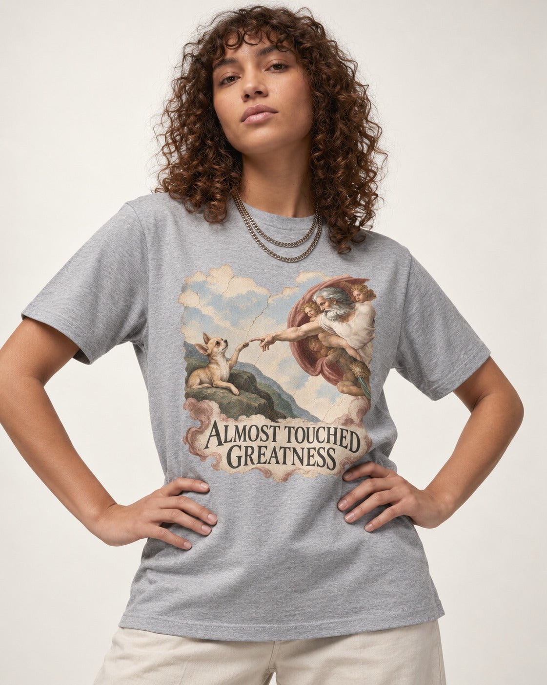 Chihuahua Almost Touched Greatness Renaissance Parody T-Shirt in Sport Grey, worn by a model