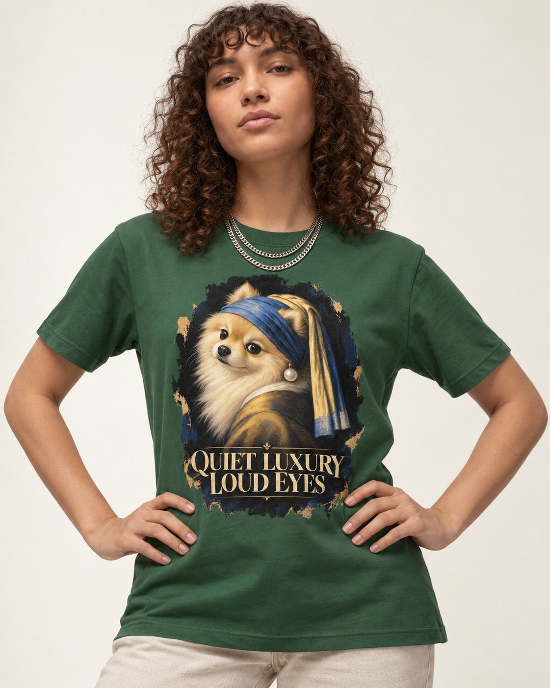 Pomeranian Quiet Luxury Loud Eyes Pearl Portrait Graphic T-Shirt in Forest Green, worn by a model