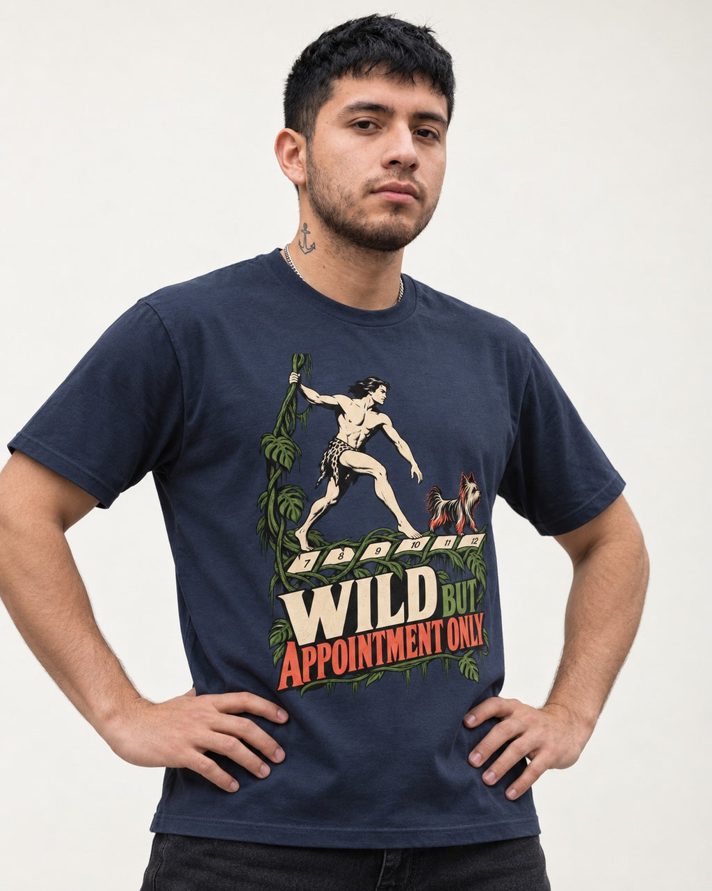 Yorkshire Terrier Wild but Appointment Only Jungle Calendar Graphic T-Shirt in Navy, worn by a model