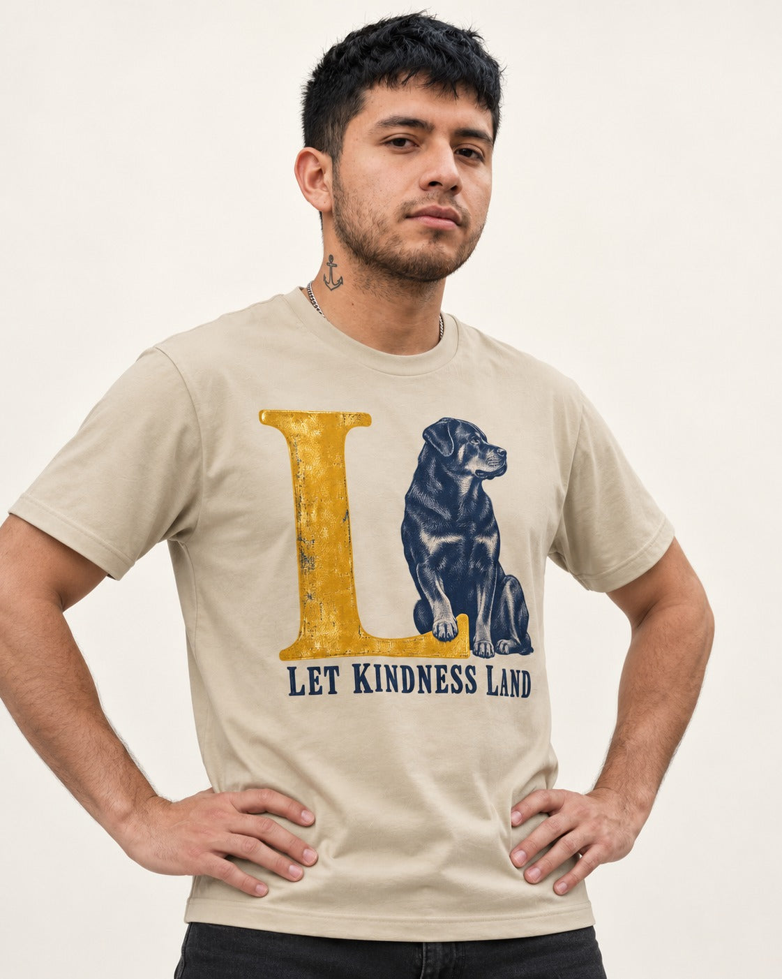 Let Kindness Lead Rottweiler T-Shirt in Sand, worn by a model