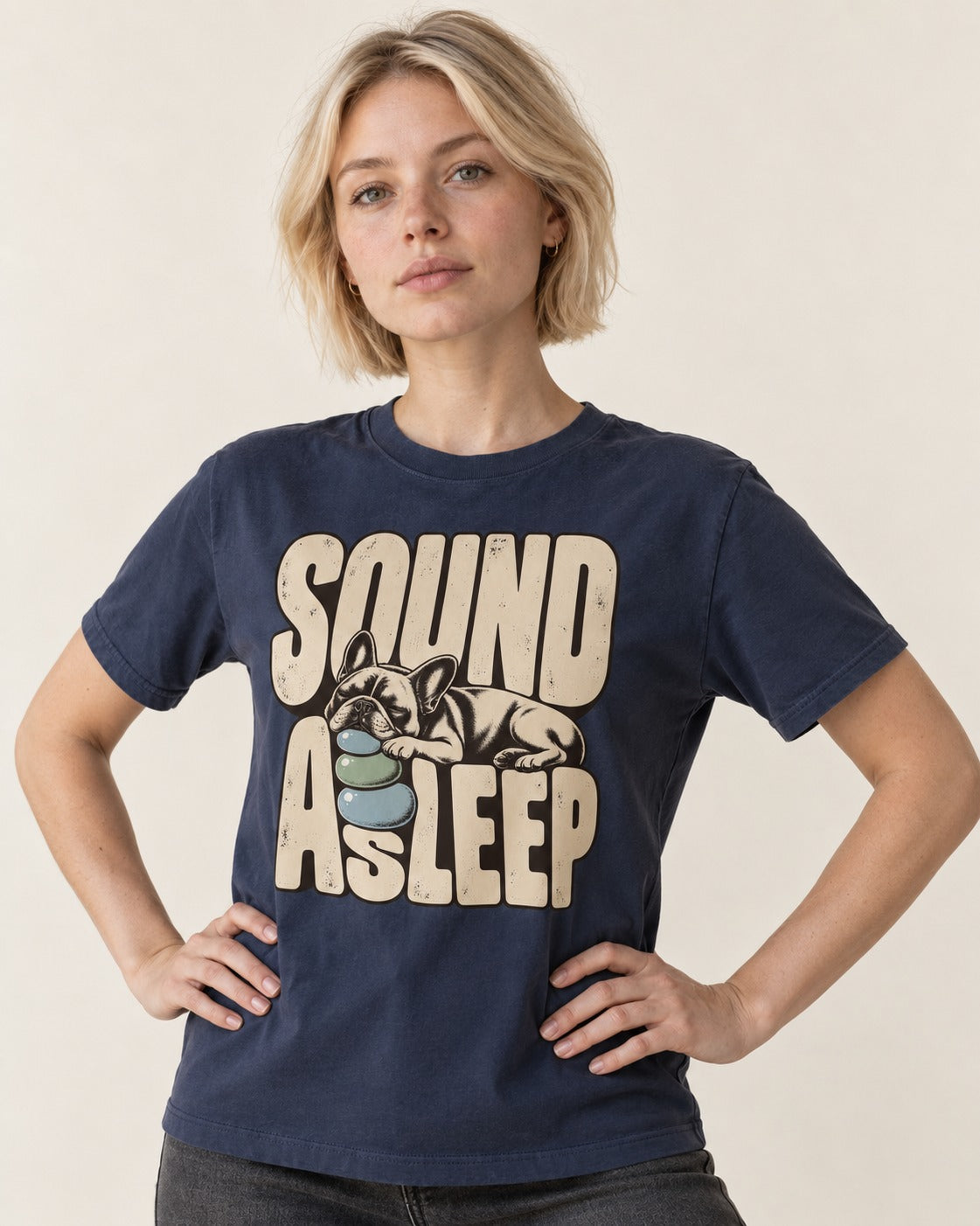 Frenchie Sound Asleep Stone Pillow Graphic T-Shirt in Navy, worn by a model