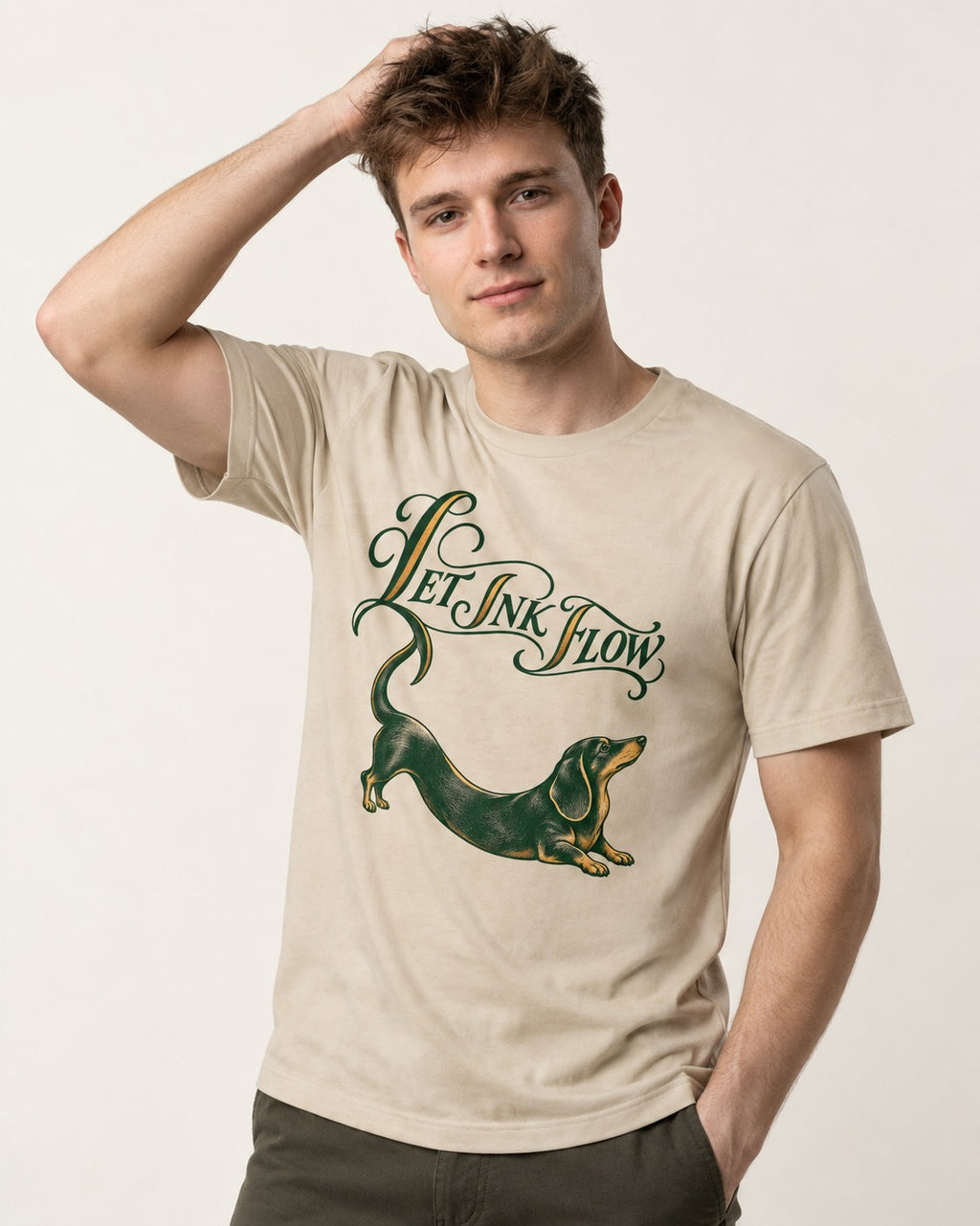 Let the Dachshund Ink Flow T-Shirt in Sand, worn by a model