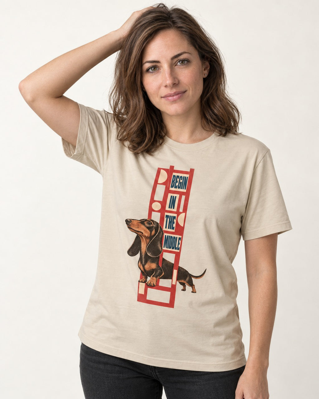Dachshund Begins in the Middle T-Shirt in Sand, worn by a model