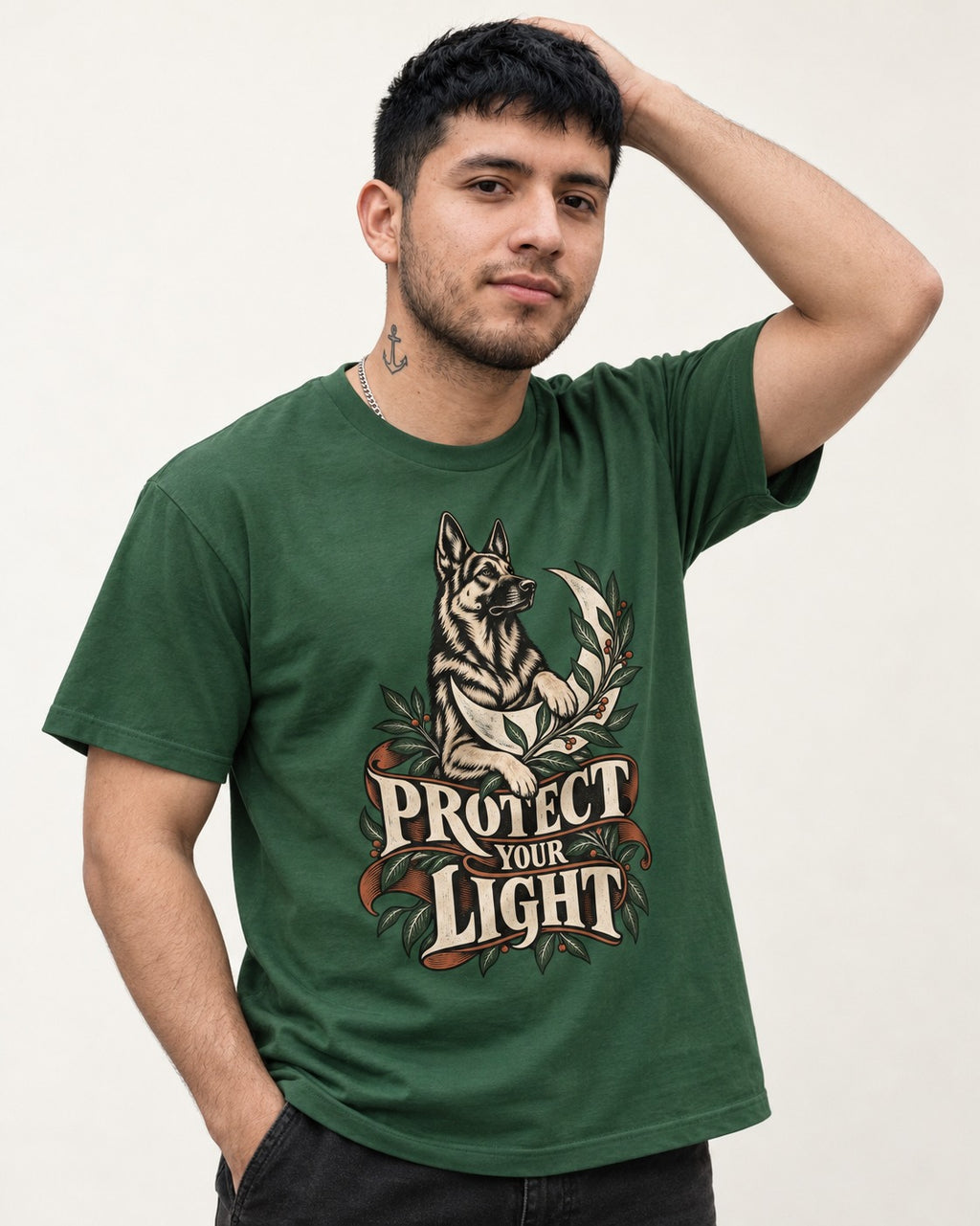 Protect Your Light Moon Botanical German Shepherd Dog Graphic T-Shirt in Forest Green, worn by a model