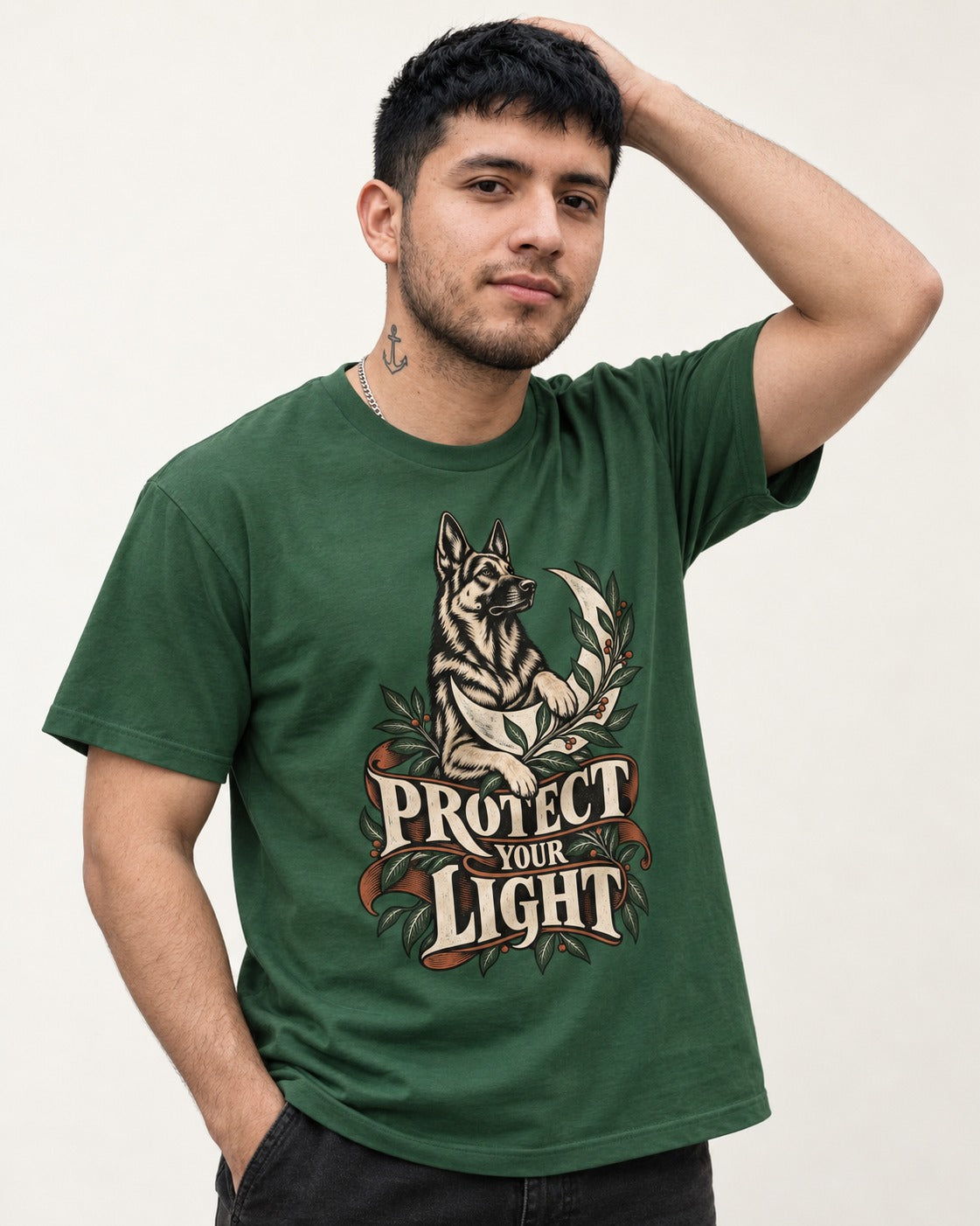 Protect Your Light Moon Botanical German Shepherd Dog Graphic T-Shirt in Forest Green, worn by a model