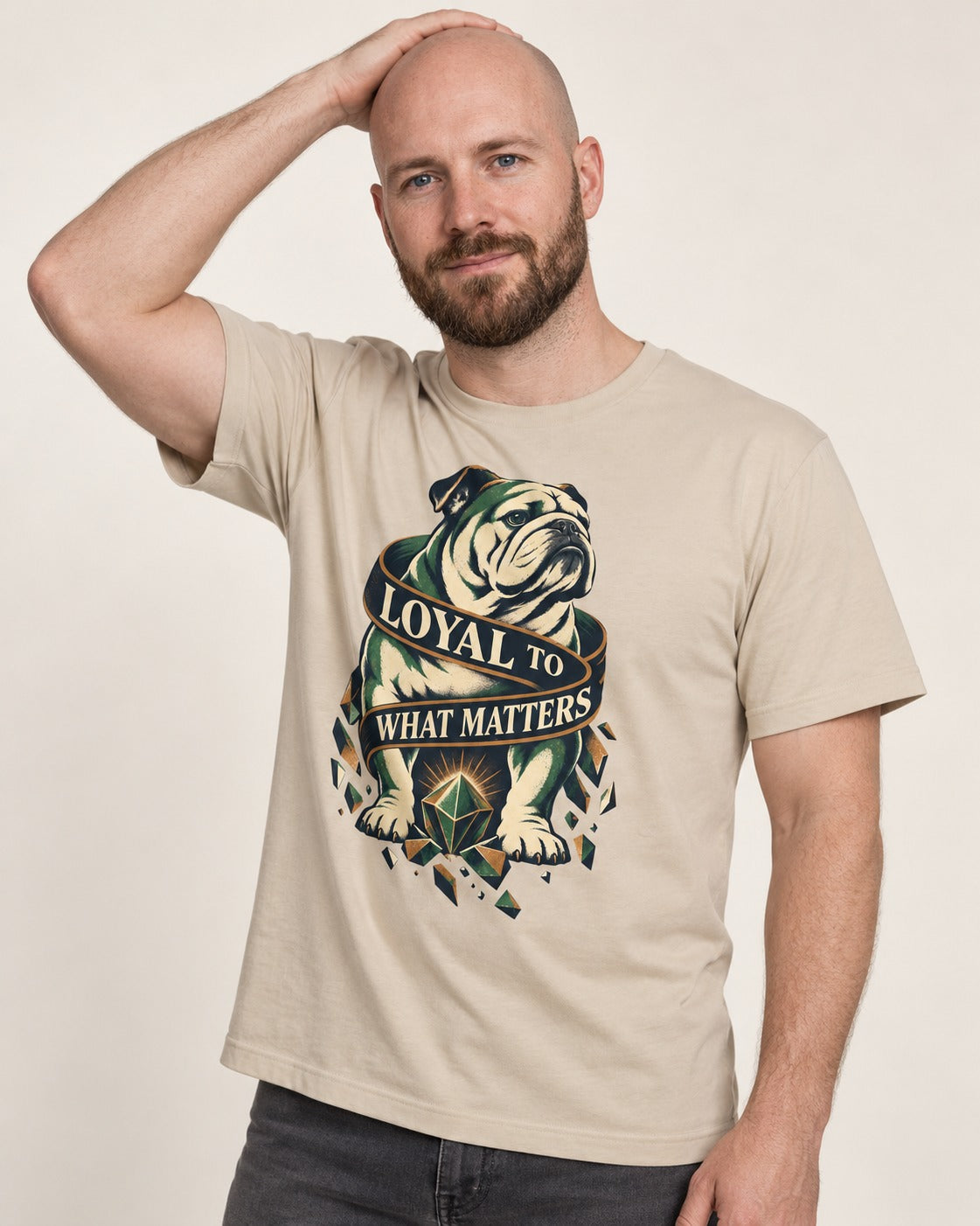 Loyal to What Matters English Bulldog T-Shirt in Sand, worn by a model