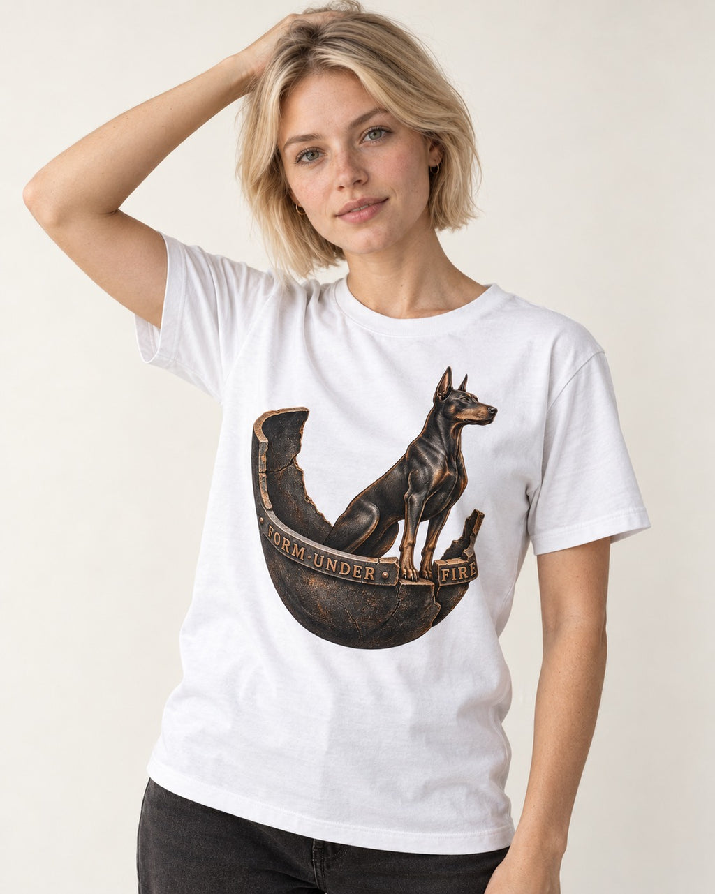 Doberman Form Under Fire Broken Shell Graphic T-Shirt in White, worn by a model