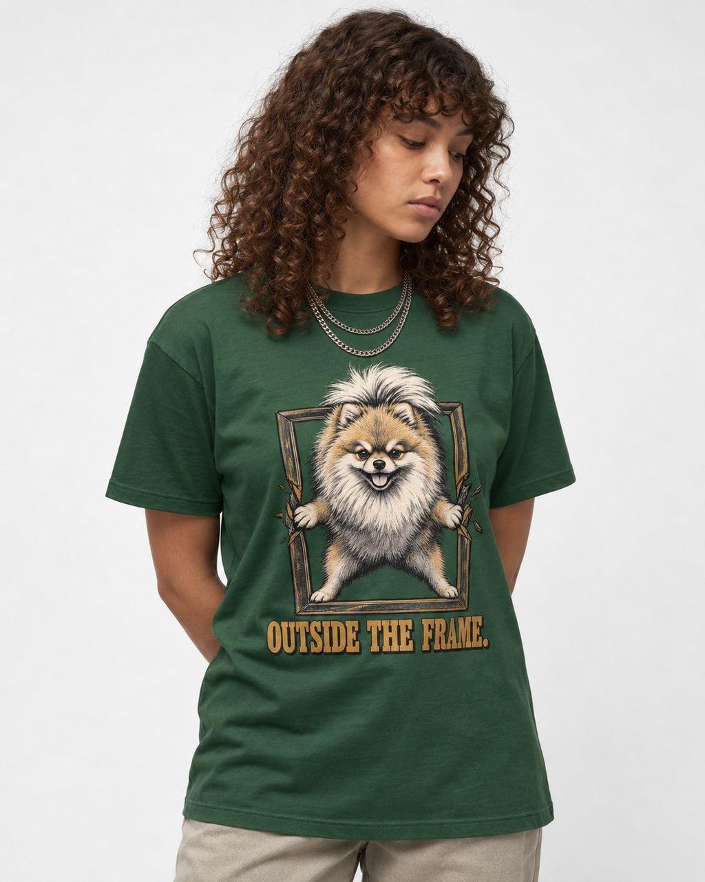 Pomeranian Outside the Frame Breakthrough Graphic T-Shirt in Forest Green, worn by a model