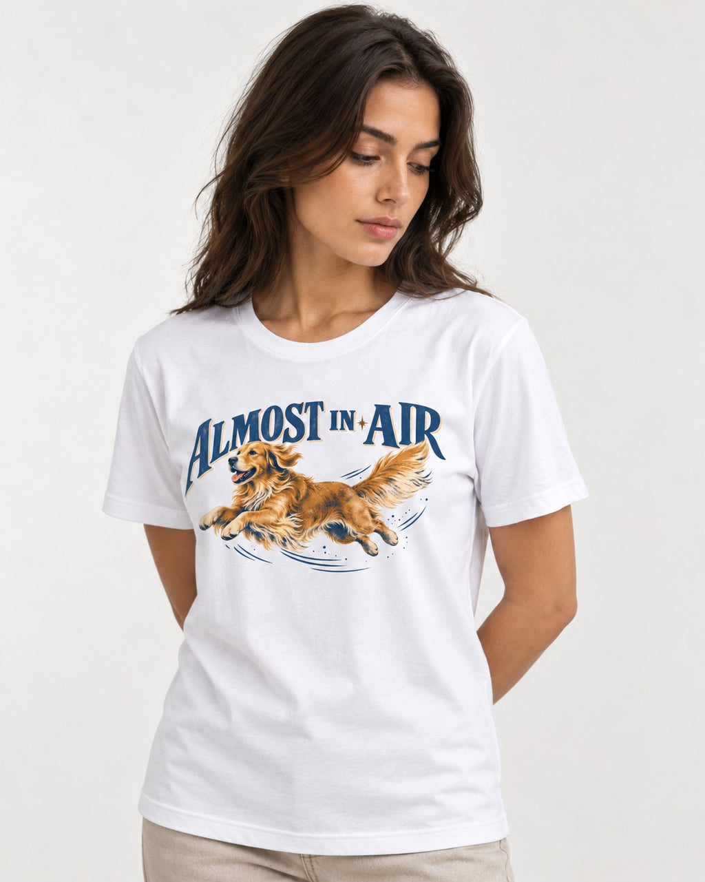 Golden Retriever Almost in Air Flying Graphic T-Shirt in White, worn by a model