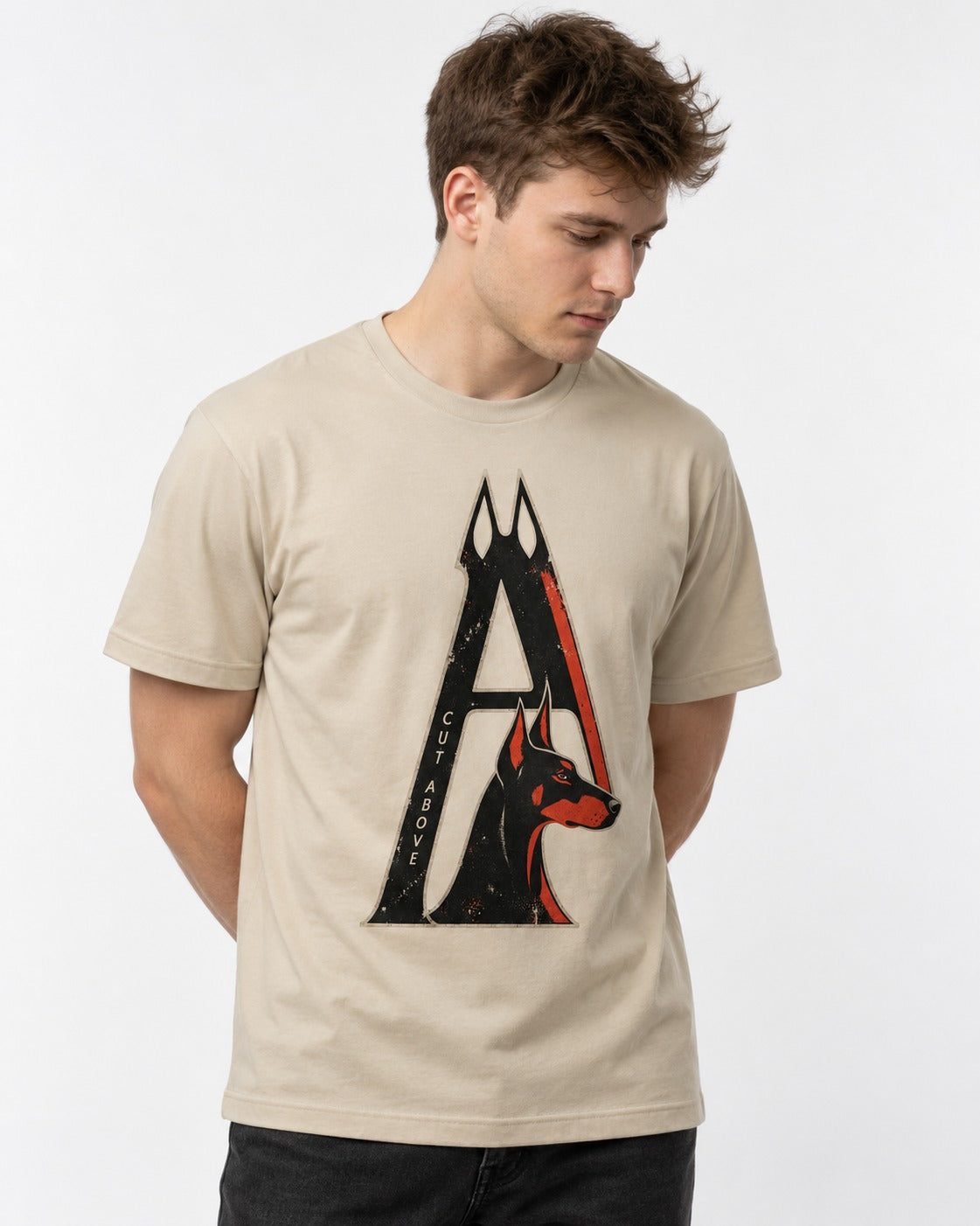 Doberman A Cut Above T-Shirt in Sand, worn by a model