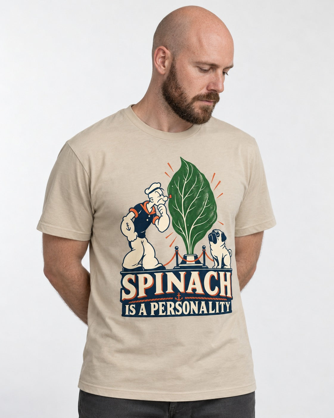 Pug Spinach Is a Personality T-Shirt in Sand, worn by a model