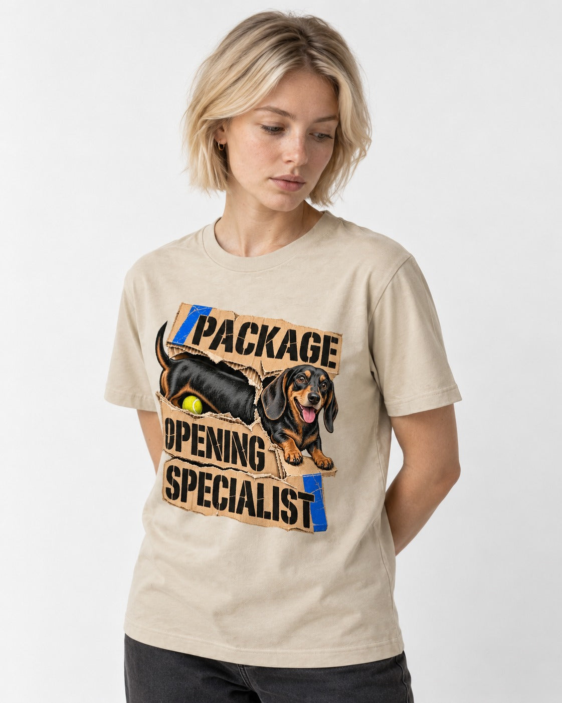 Dachshund Package Opening Specialist T-Shirt in Sand, worn by a model