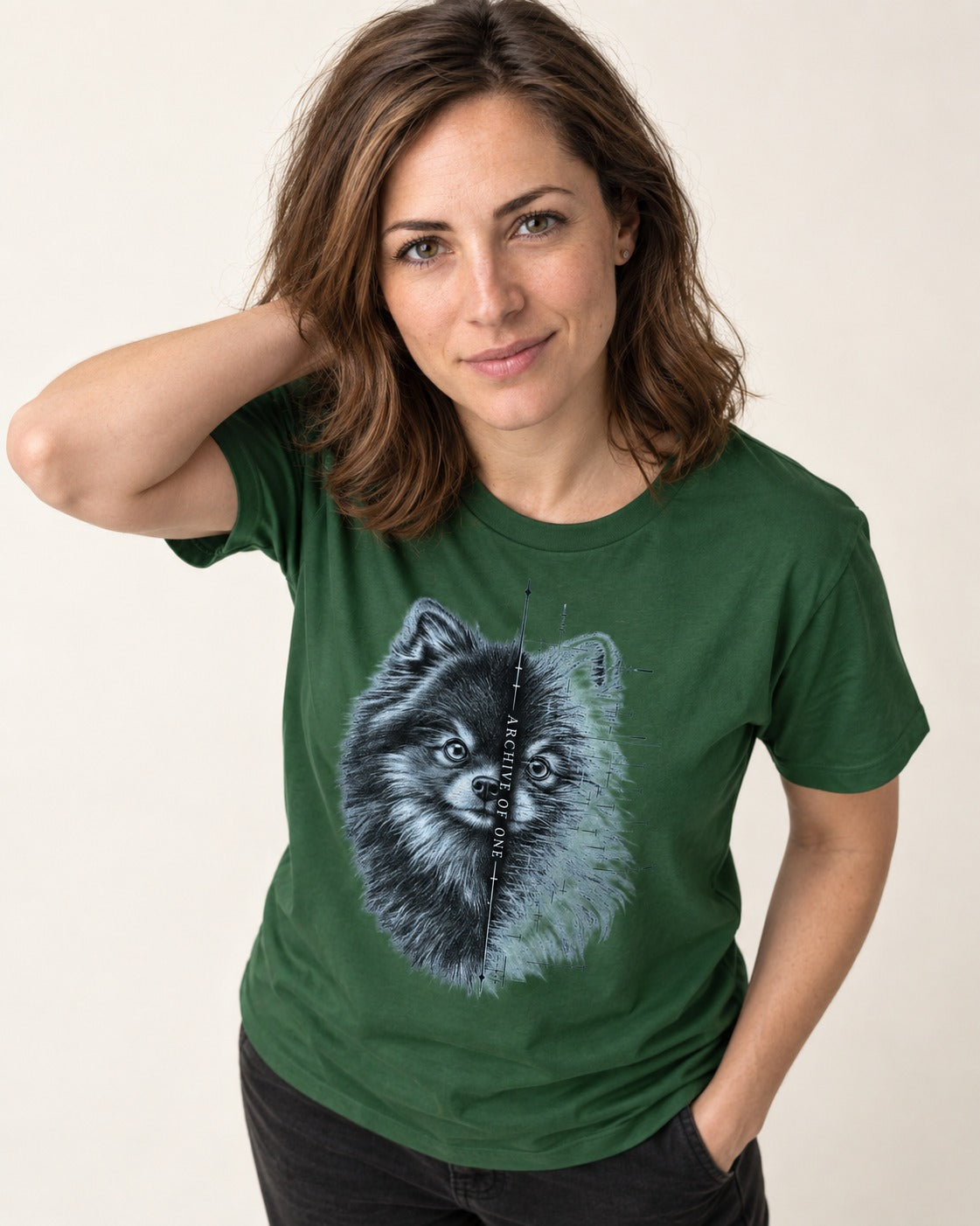 Pomeranian Archive of One Split Portrait Graphic T-Shirt in Forest Green, worn by a model