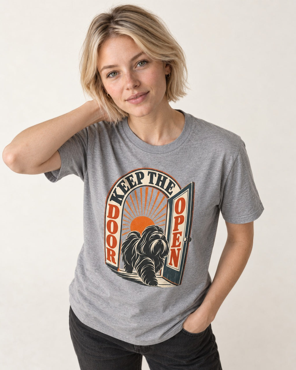 Shih Tzu Keep the Door Open Retro Doorway Graphic T-Shirt in Sport Grey, worn by a model