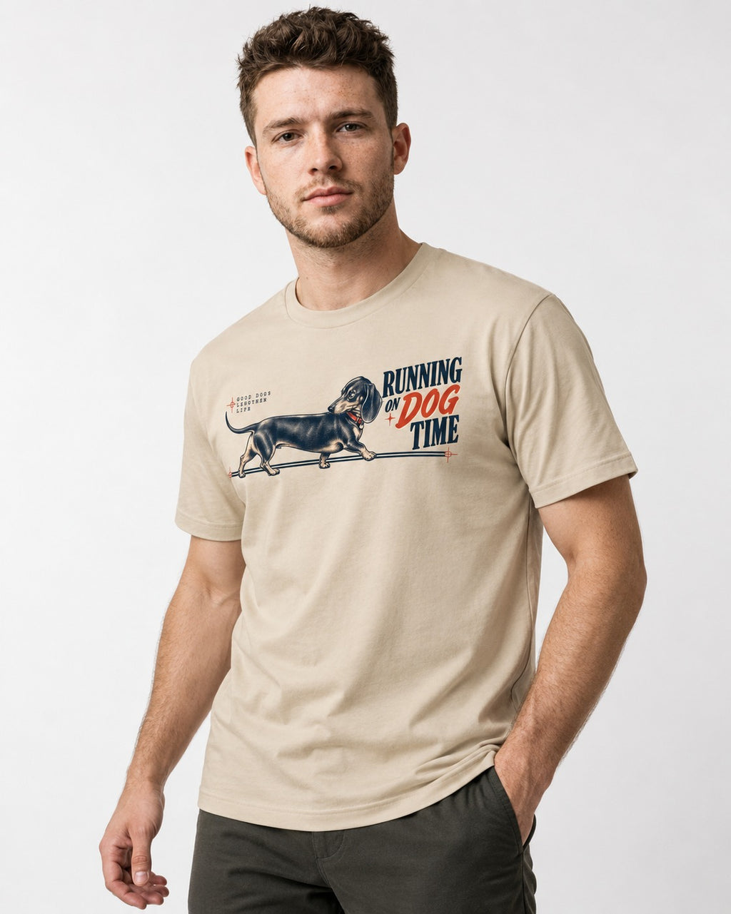 Dachshund Lengthens Life T-Shirt in Sand, worn by a model
