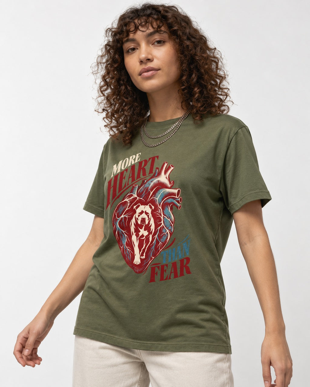 Pitbull More Heart Than Fear Anatomical Heart Graphic T-Shirt in Heather Military Green, worn by a model