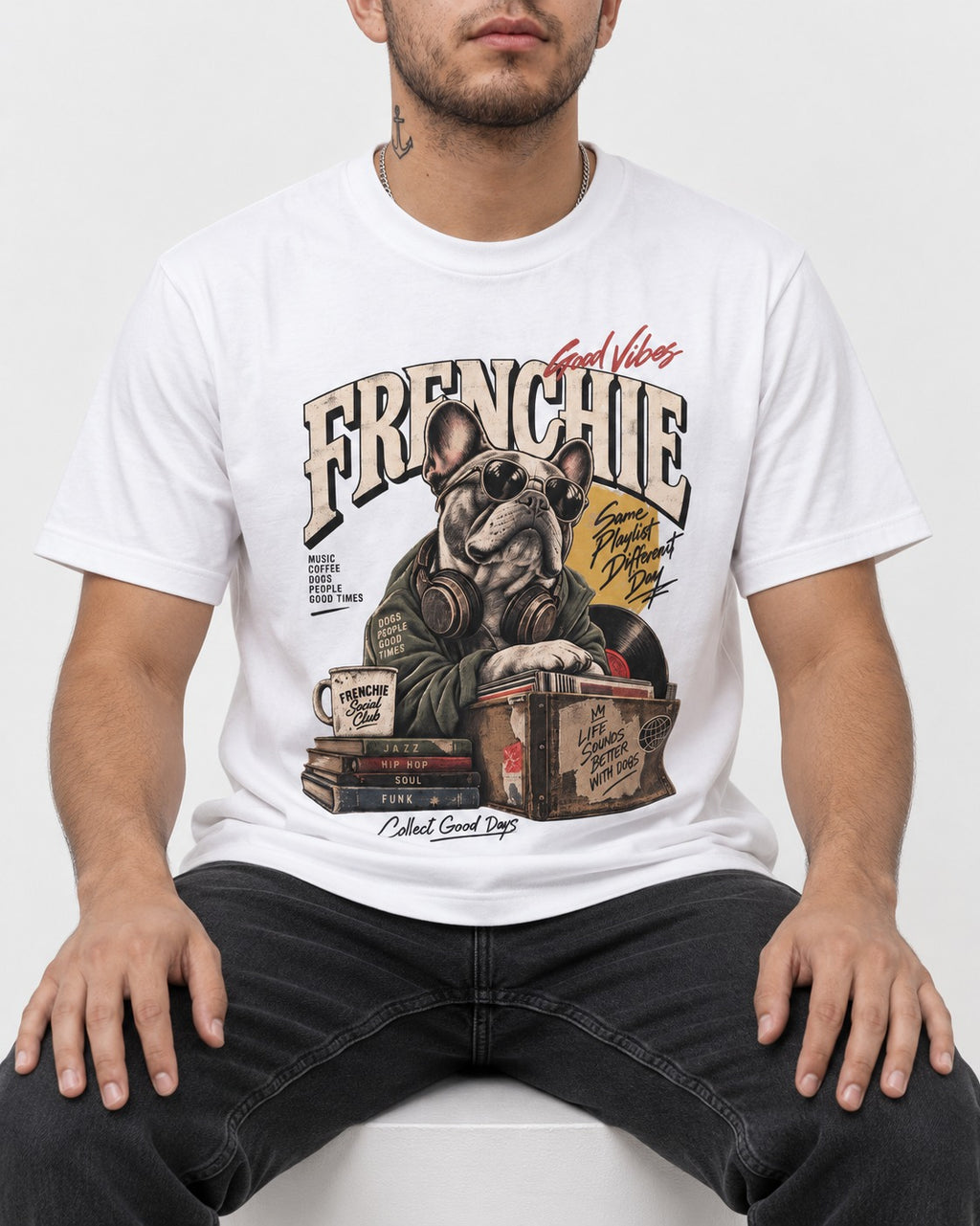 Frenchie Social Club T-Shirt in White, worn by a seated model