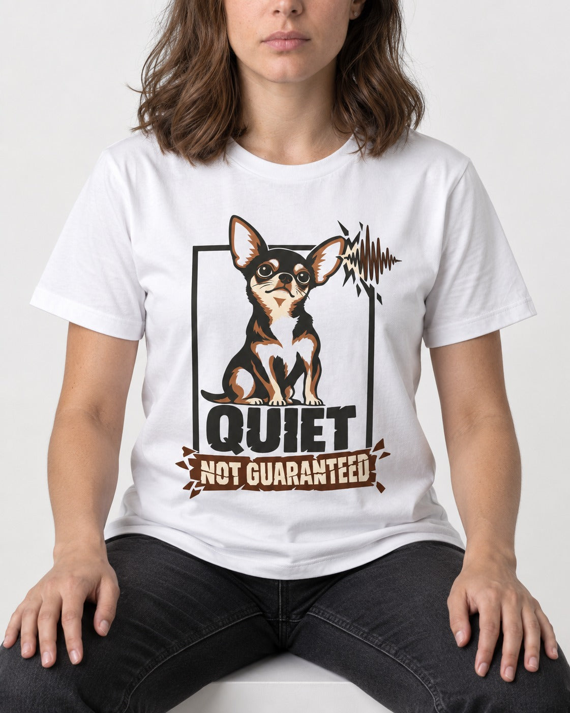 Chihuahua Quiet Not Guaranteed Framed Portrait Graphic T-Shirt in White, worn by a seated model