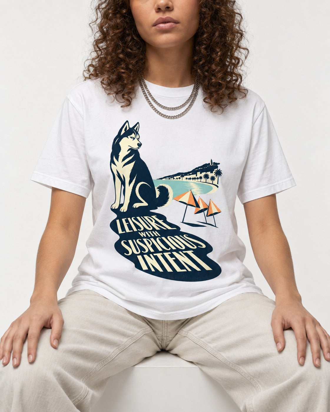 Husky Leisure with Suspicious Intent T-Shirt in White, worn by a seated model