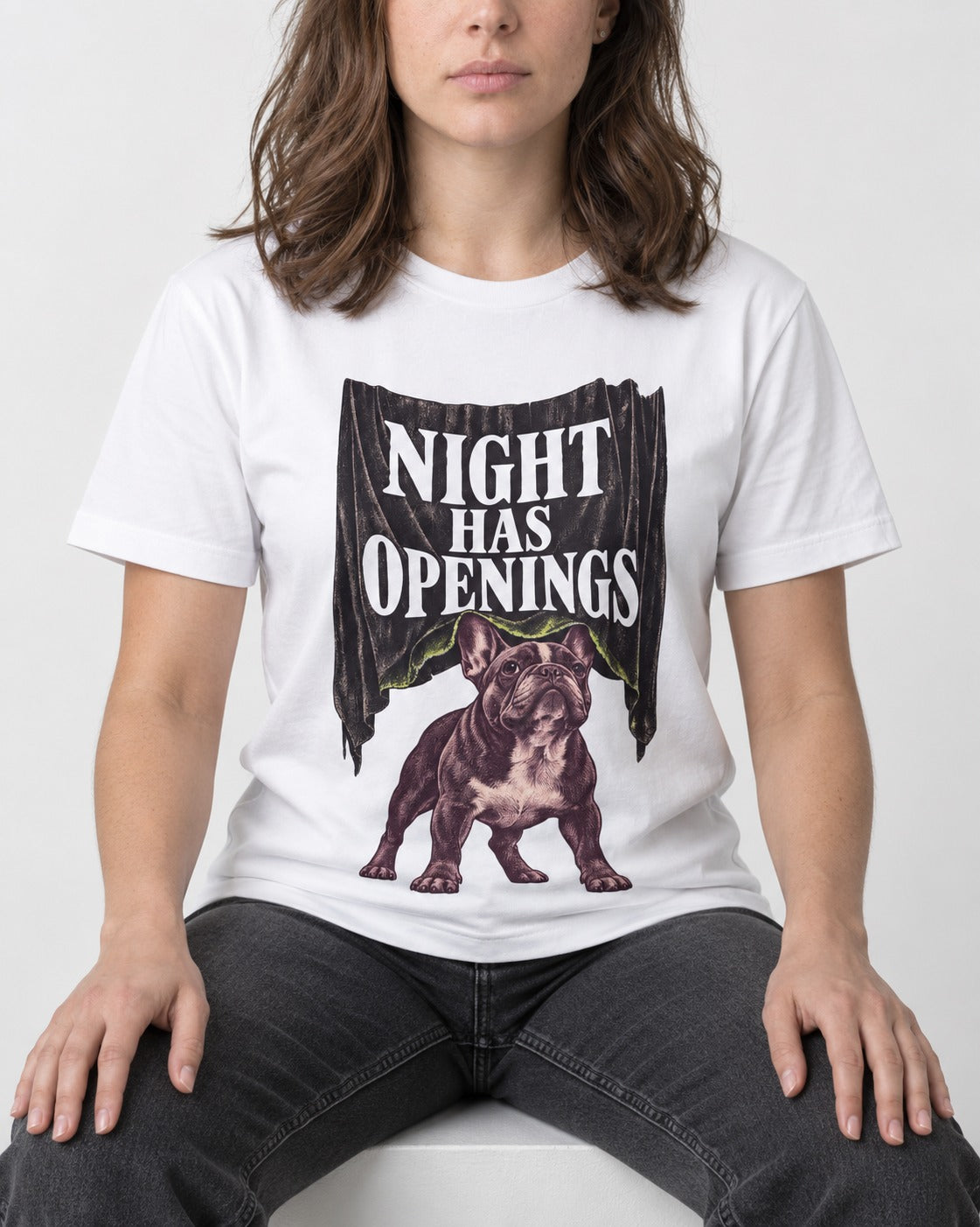 Night Has Openings Frenchie T-Shirt in White, worn by a seated model