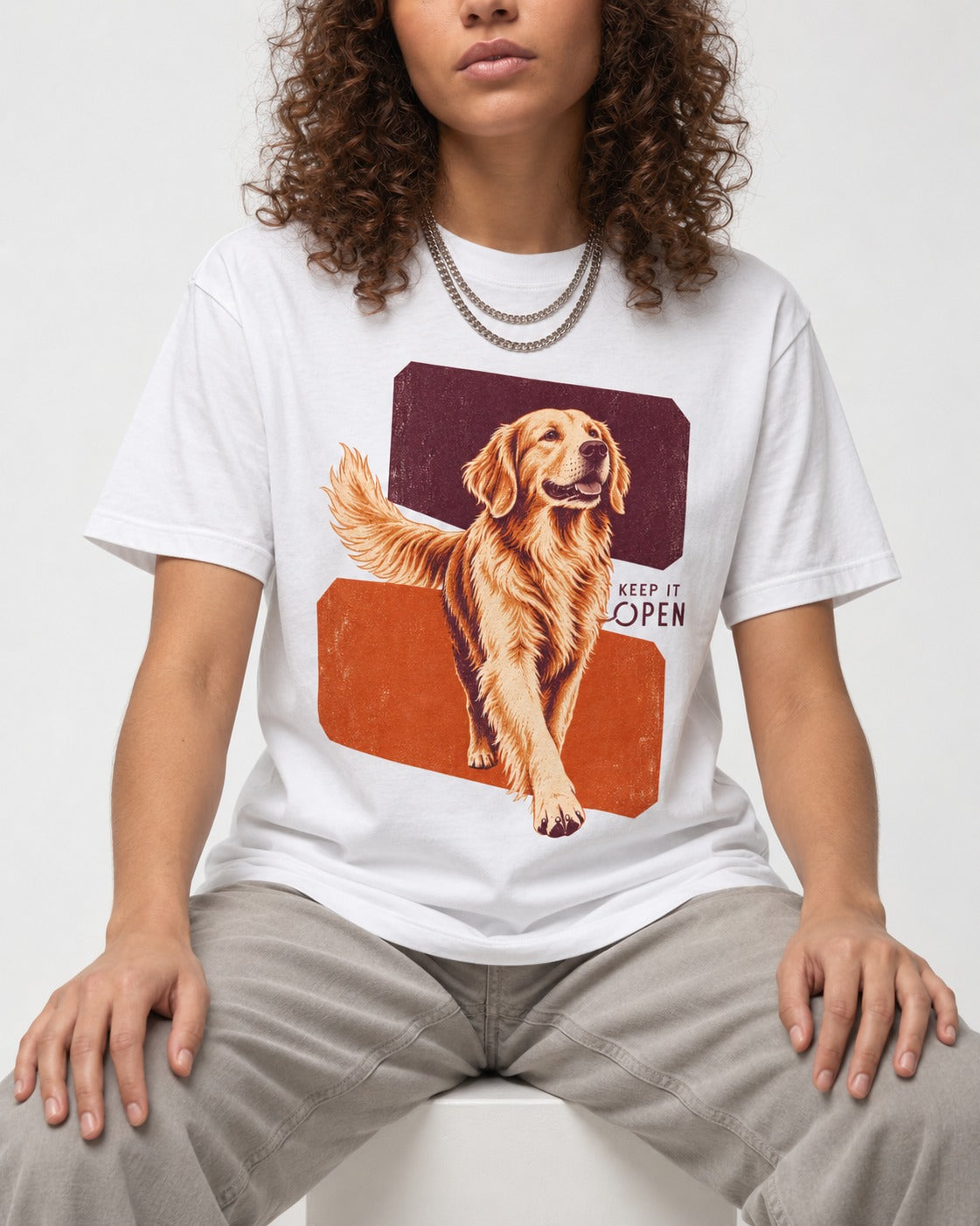 Golden Retriever Keep It Open T-Shirt in White, worn by a seated model