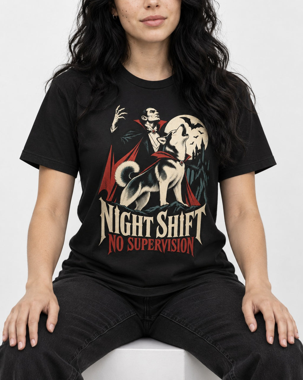 Husky Night Shift No Supervision Vampire Graphic T-Shirt in Black, worn by a seated model