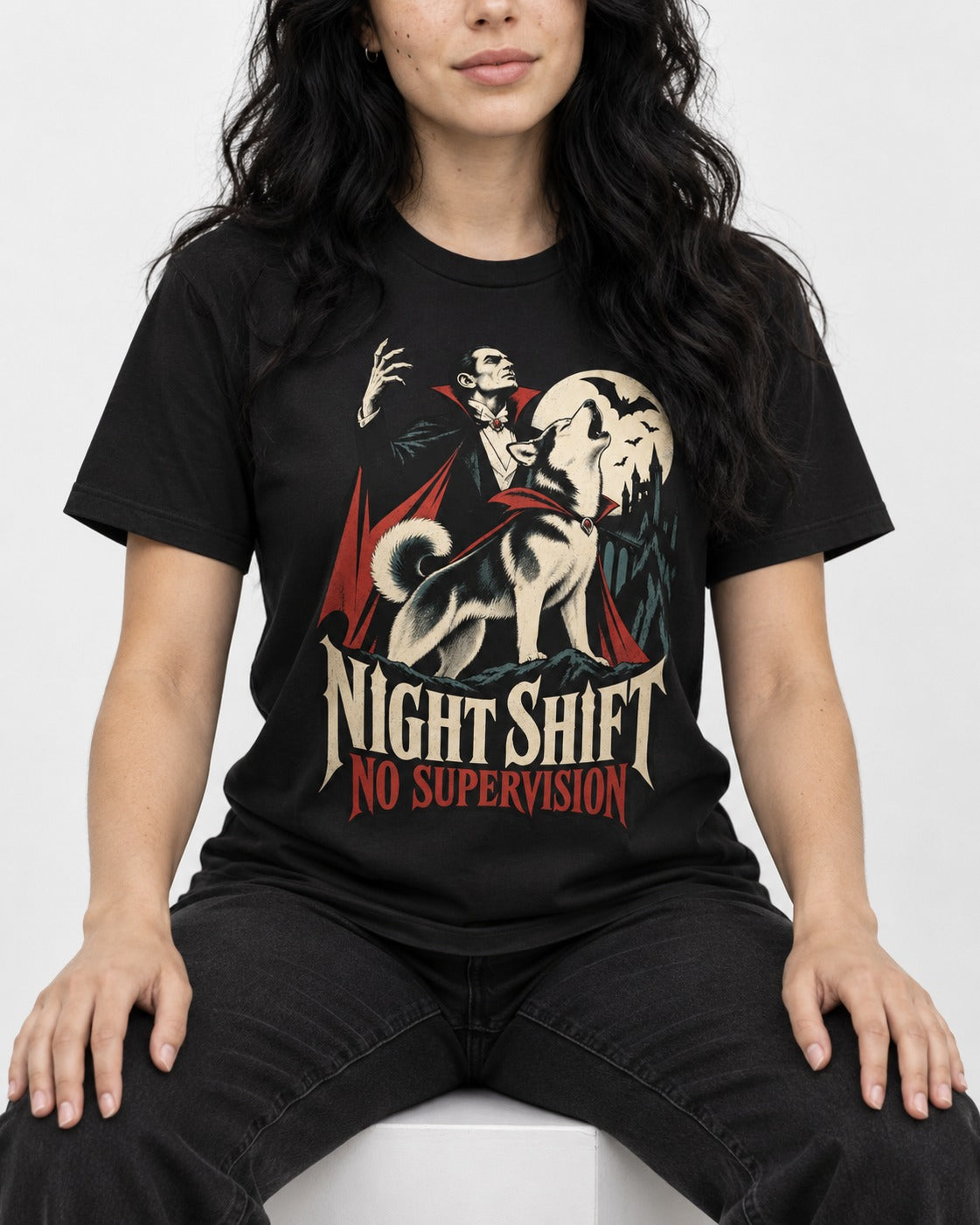 Husky Night Shift No Supervision Vampire Graphic T-Shirt in Black, worn by a seated model