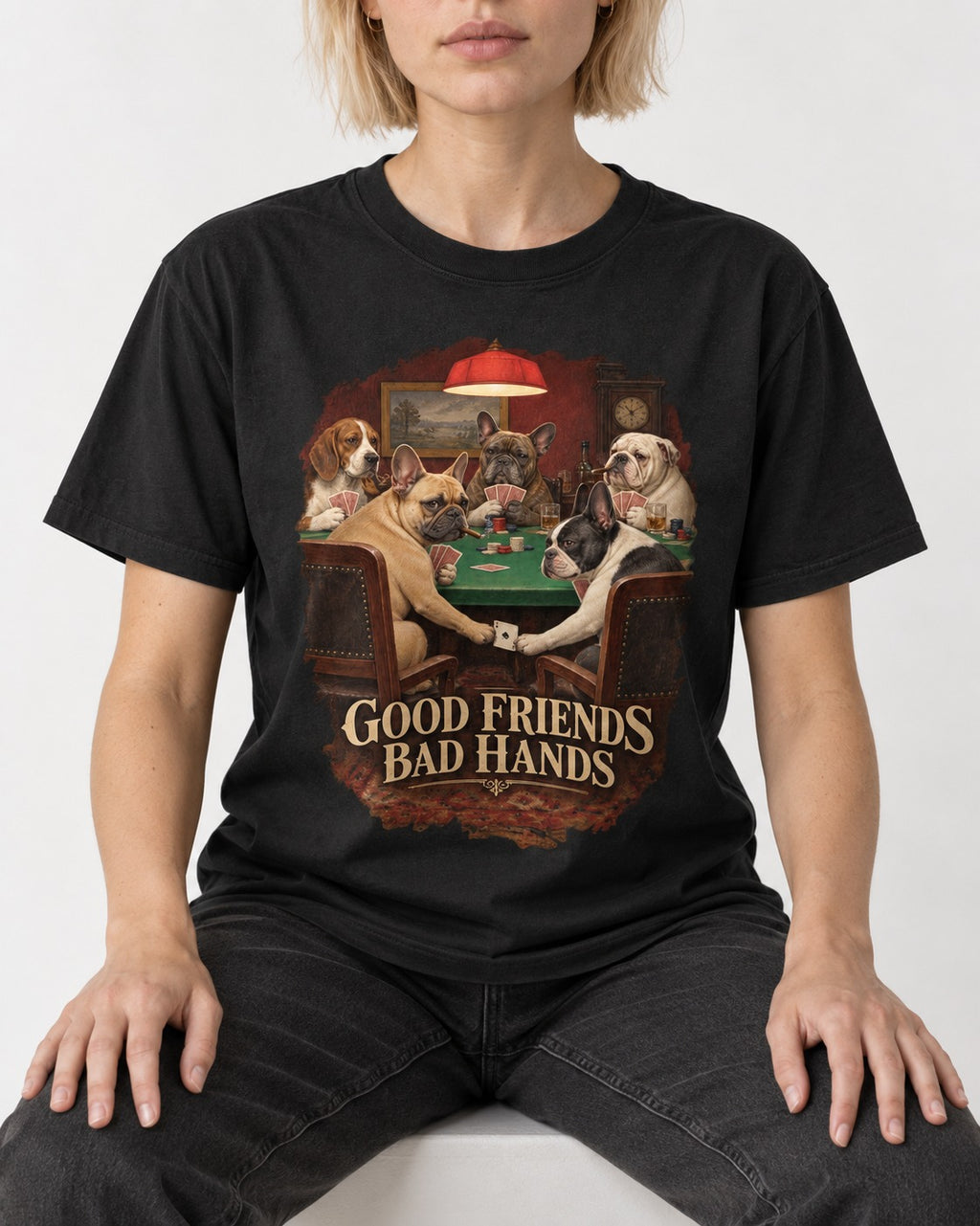 Frenchie Good Friends Bad Hands Poker Graphic T-Shirt in Black, worn by a seated model