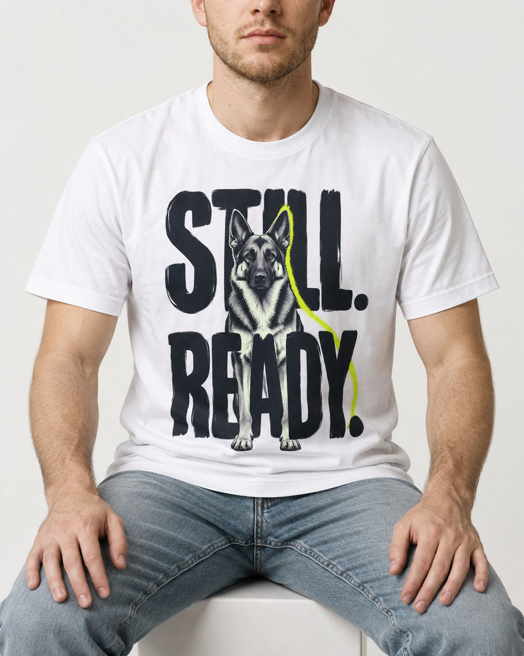 Still Ready German Shepherd Dog T-Shirt in White, worn by a seated model