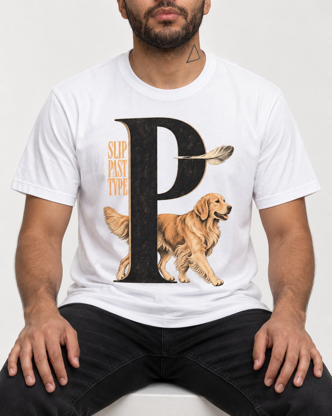 Golden Retriever Slip Past Type T-Shirt in White, worn by a seated model