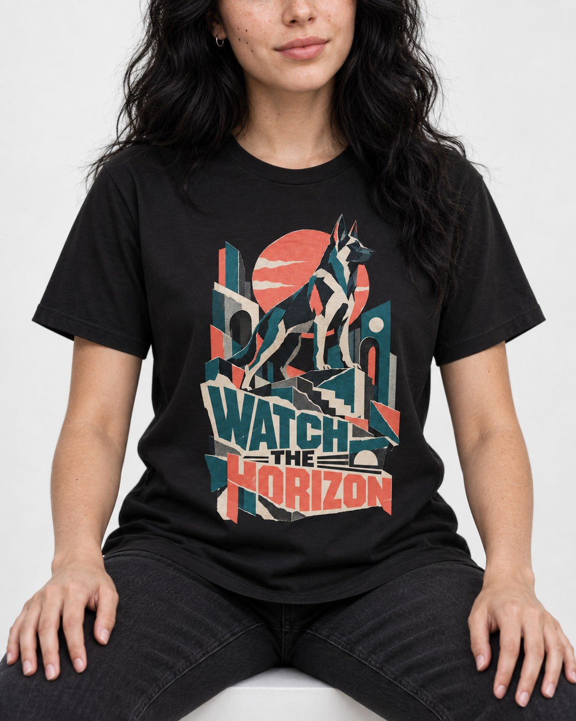 Watch The Horizon Cut Paper Cityscape German Shepherd Dog Graphic T-Shirt in Black, worn by a seated model