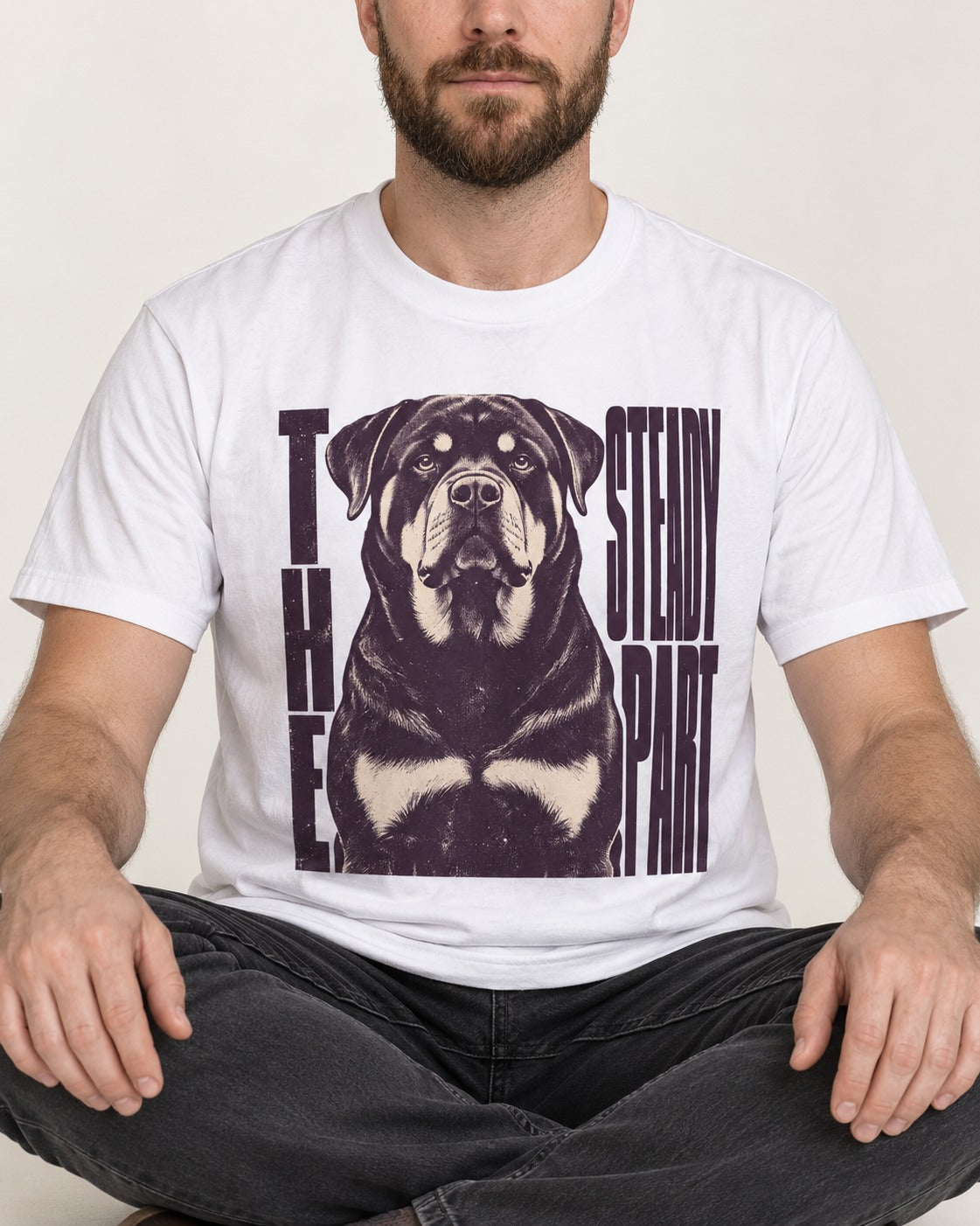 Rottweiler The Steady Part T-Shirt in White, worn by a seated model