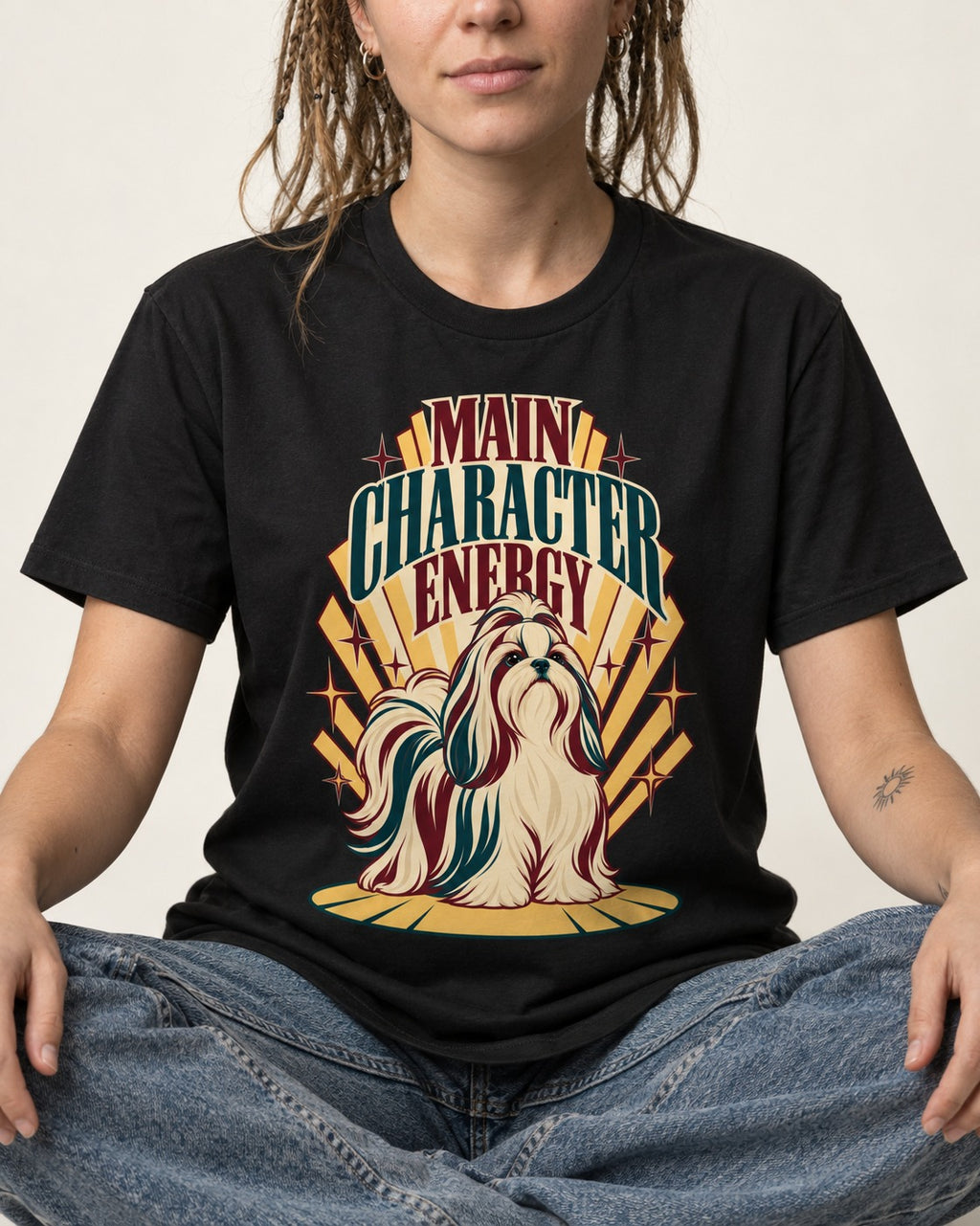 Shih Tzu Main Character Energy Art Deco Graphic T-Shirt in Black, worn by a seated model