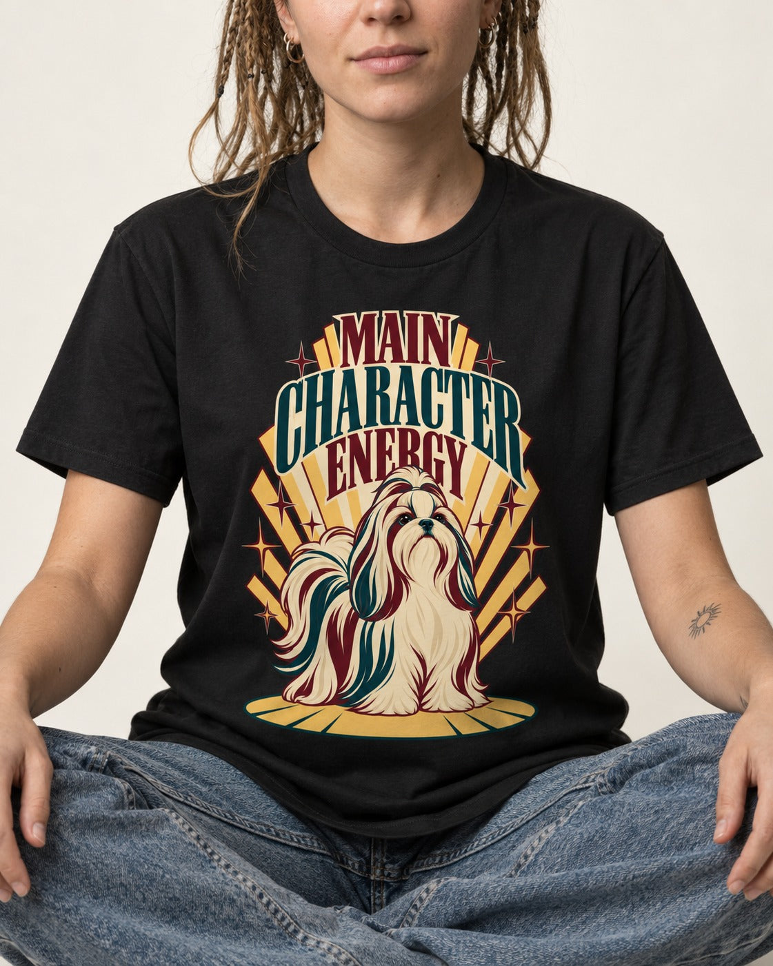 Shih Tzu Main Character Energy Art Deco Graphic T-Shirt in Black, worn by a seated model
