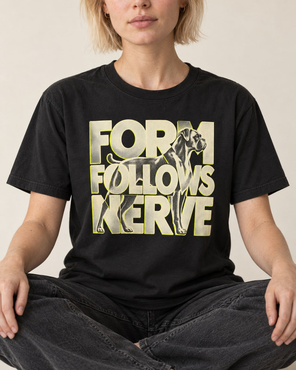 Form Follows Nerve Boxer Typography T-Shirt in Black, worn by a seated model