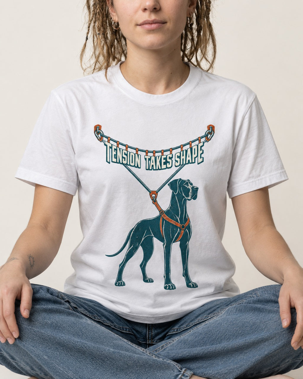 Great Dane Tension Takes Shape T-Shirt in White, worn by a seated model