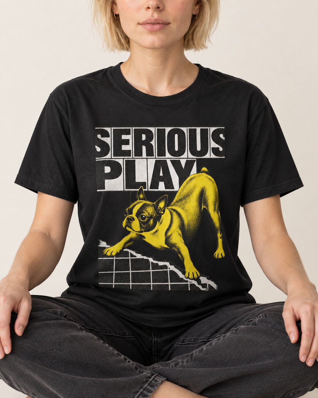 Boston Terrier Serious Play Agility Graphic T-Shirt in Black, worn by a seated model