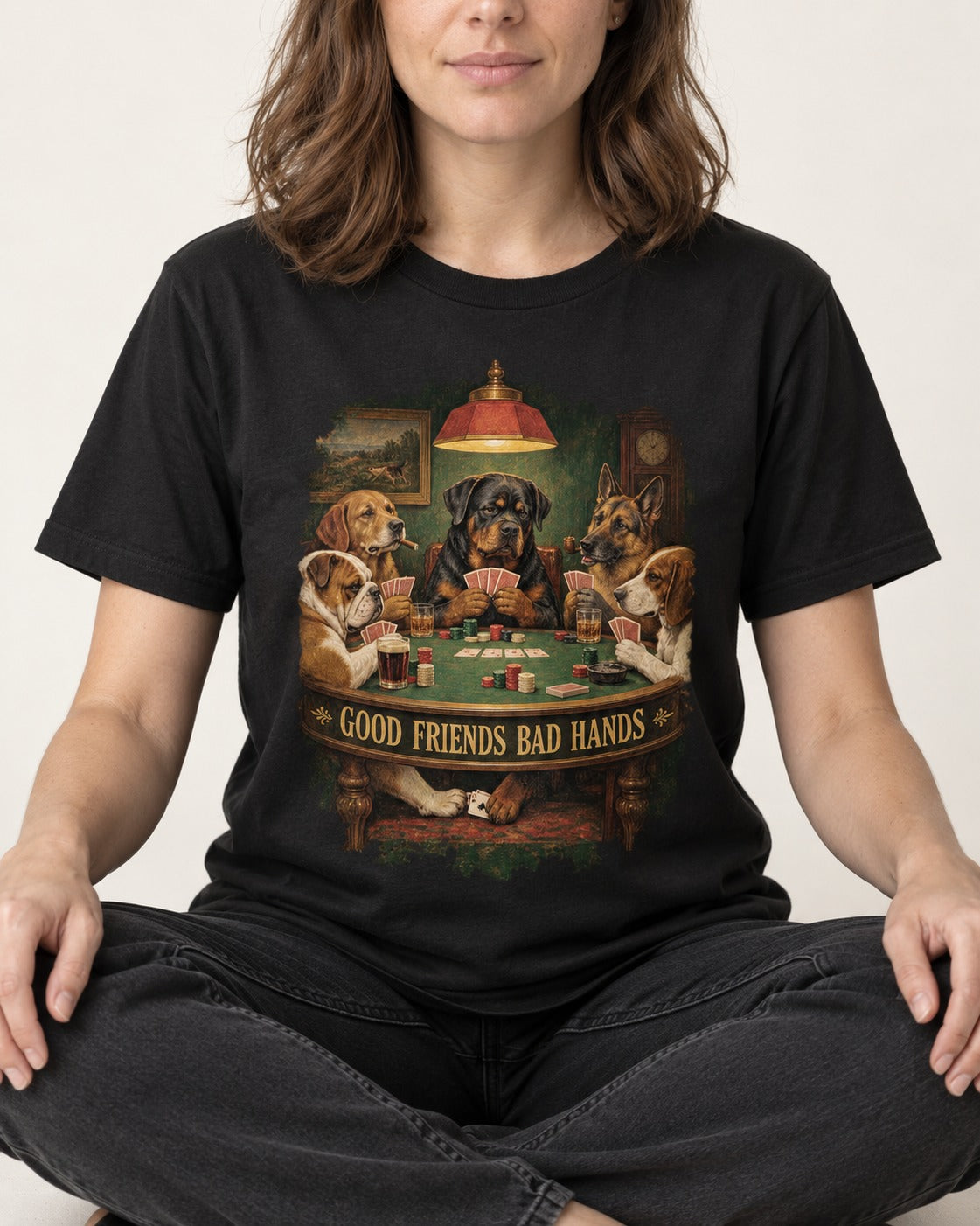 Rottweiler Good Friends Bad Hands Poker Night Graphic T-Shirt in Black, worn by a seated model