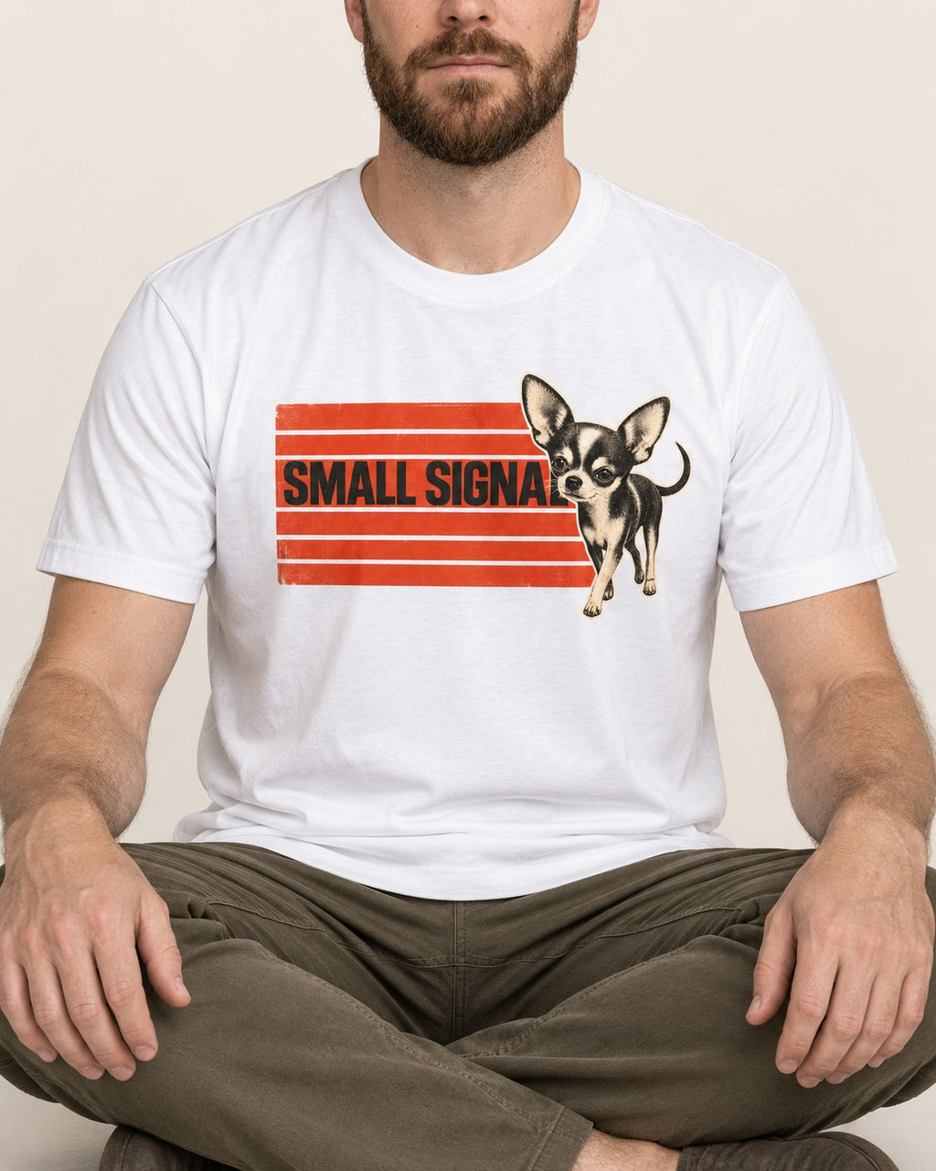 Small Signal Chihuahua T-Shirt in White, worn by a seated model