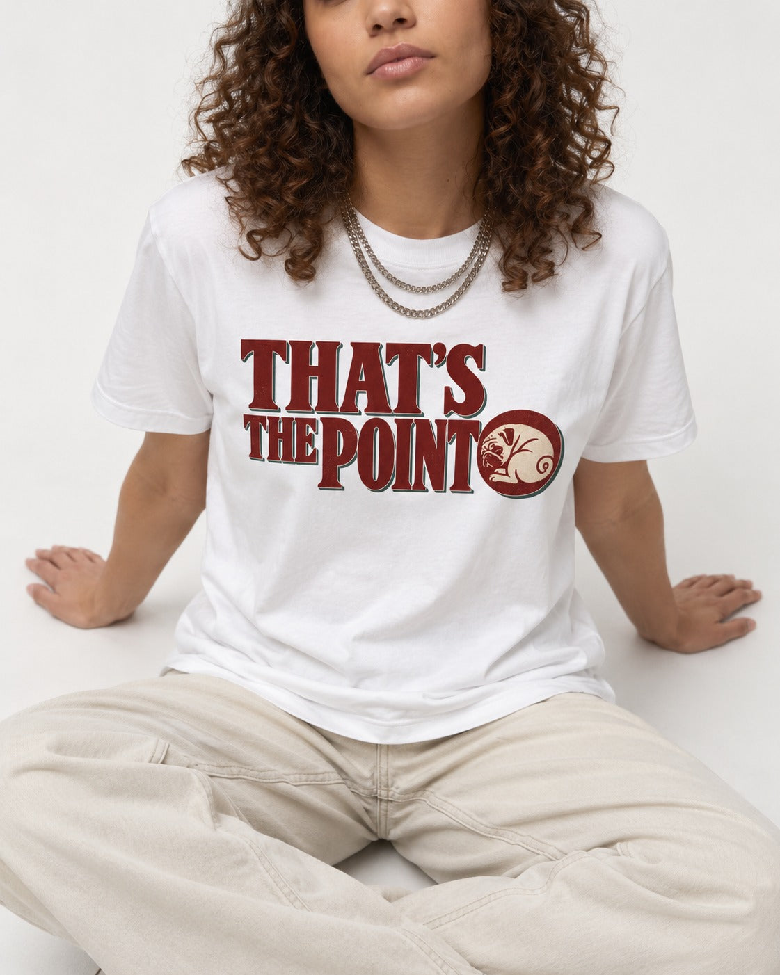 Pug's the Point T-Shirt in White, worn by a seated model