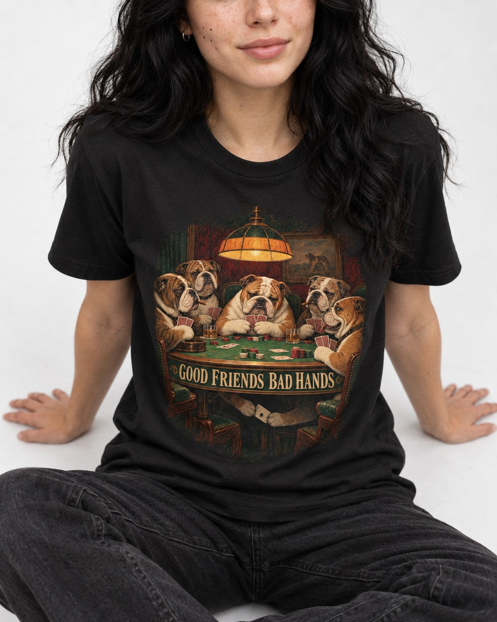English Bulldog Good Friends Bad Hands Poker Graphic T-Shirt in Black, worn by a seated model