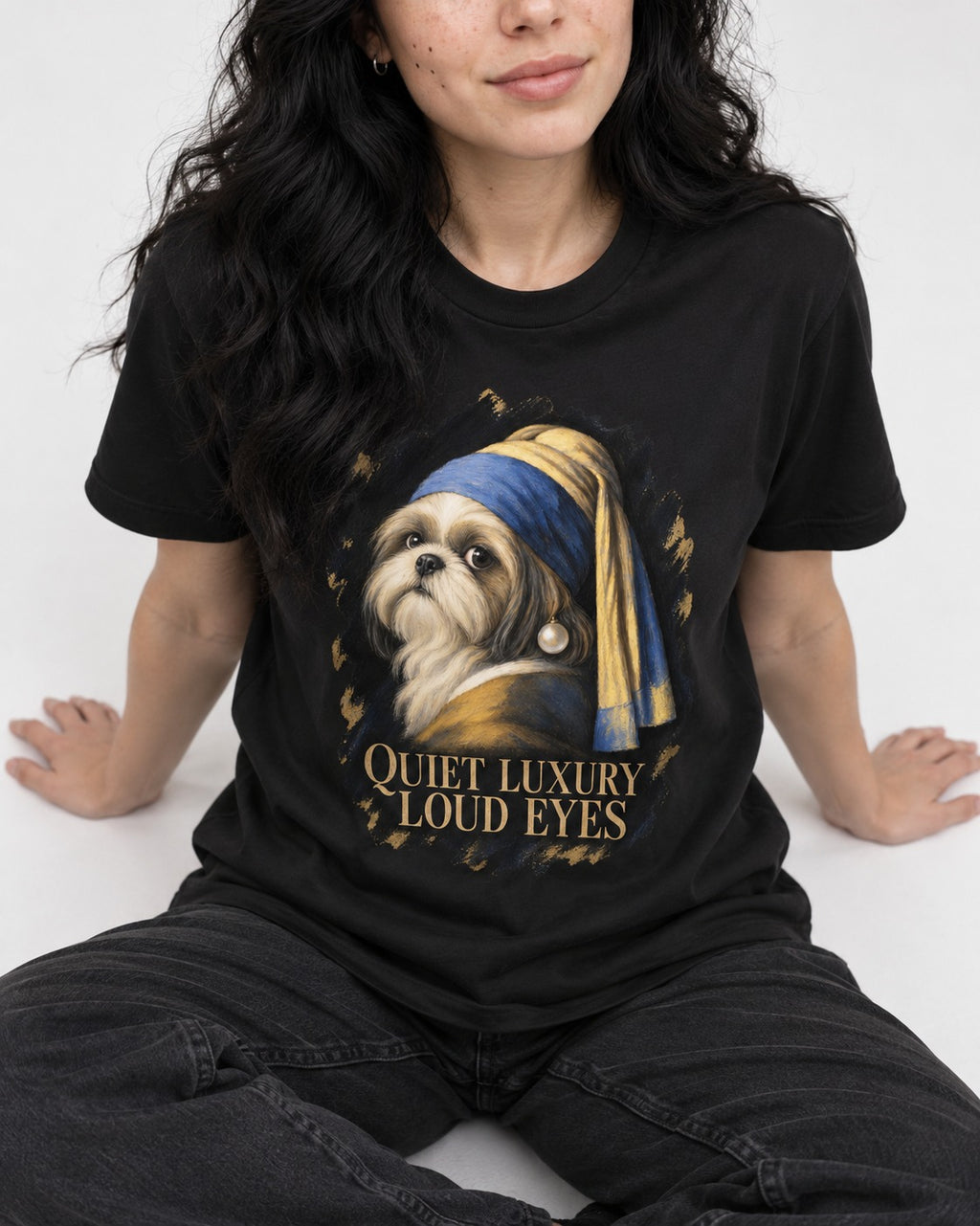 Shih Tzu Quiet Luxury Loud Eyes Pearl Portrait Graphic T-Shirt in Black, worn by a seated model