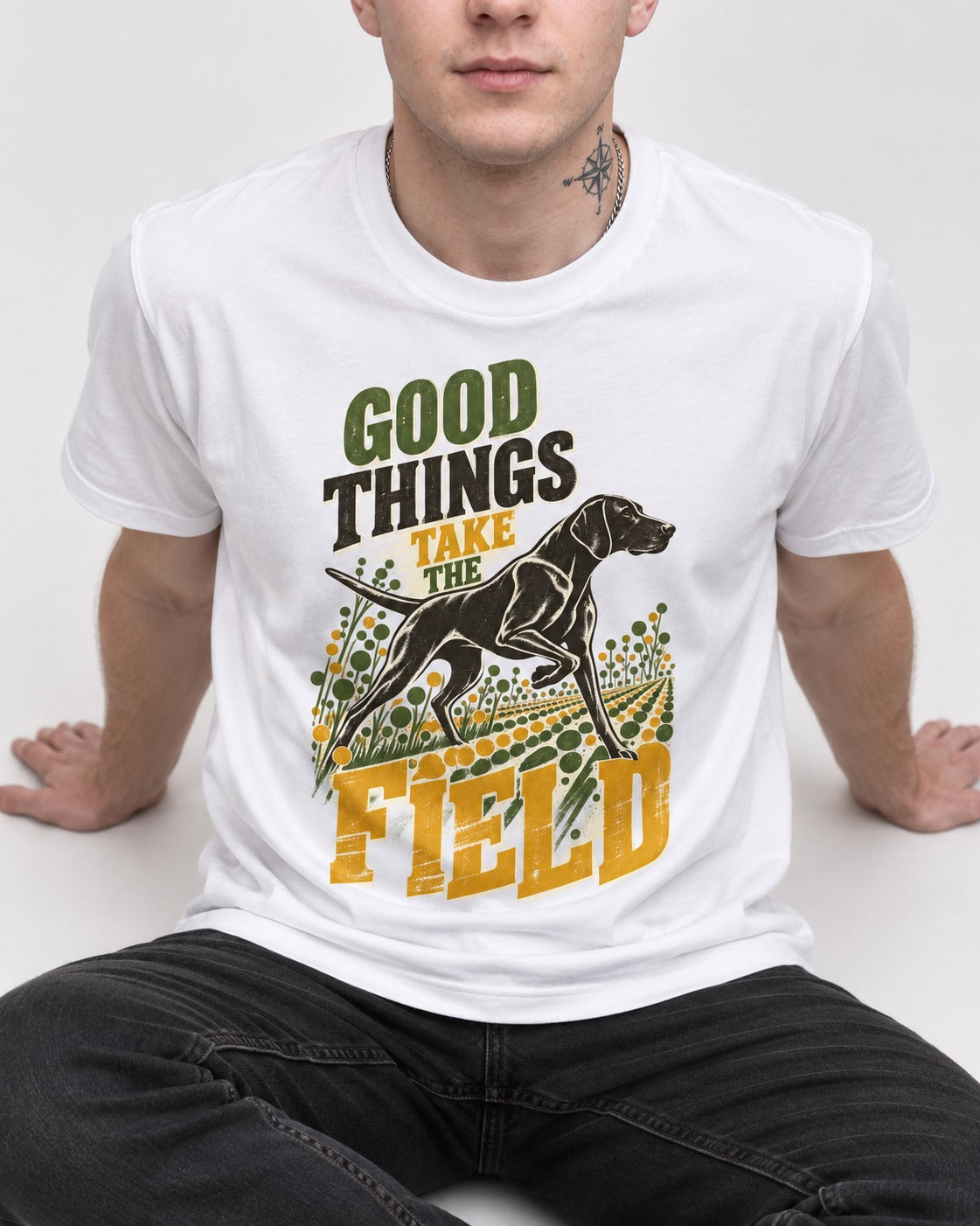 German Shorthaired Pointer Takes the Field T-Shirt in White, worn by a seated model