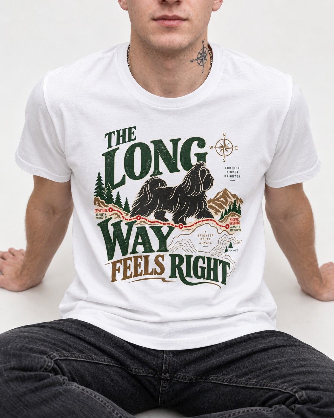 Shih Tzu Takes the Long Way T-Shirt in White, worn by a seated model